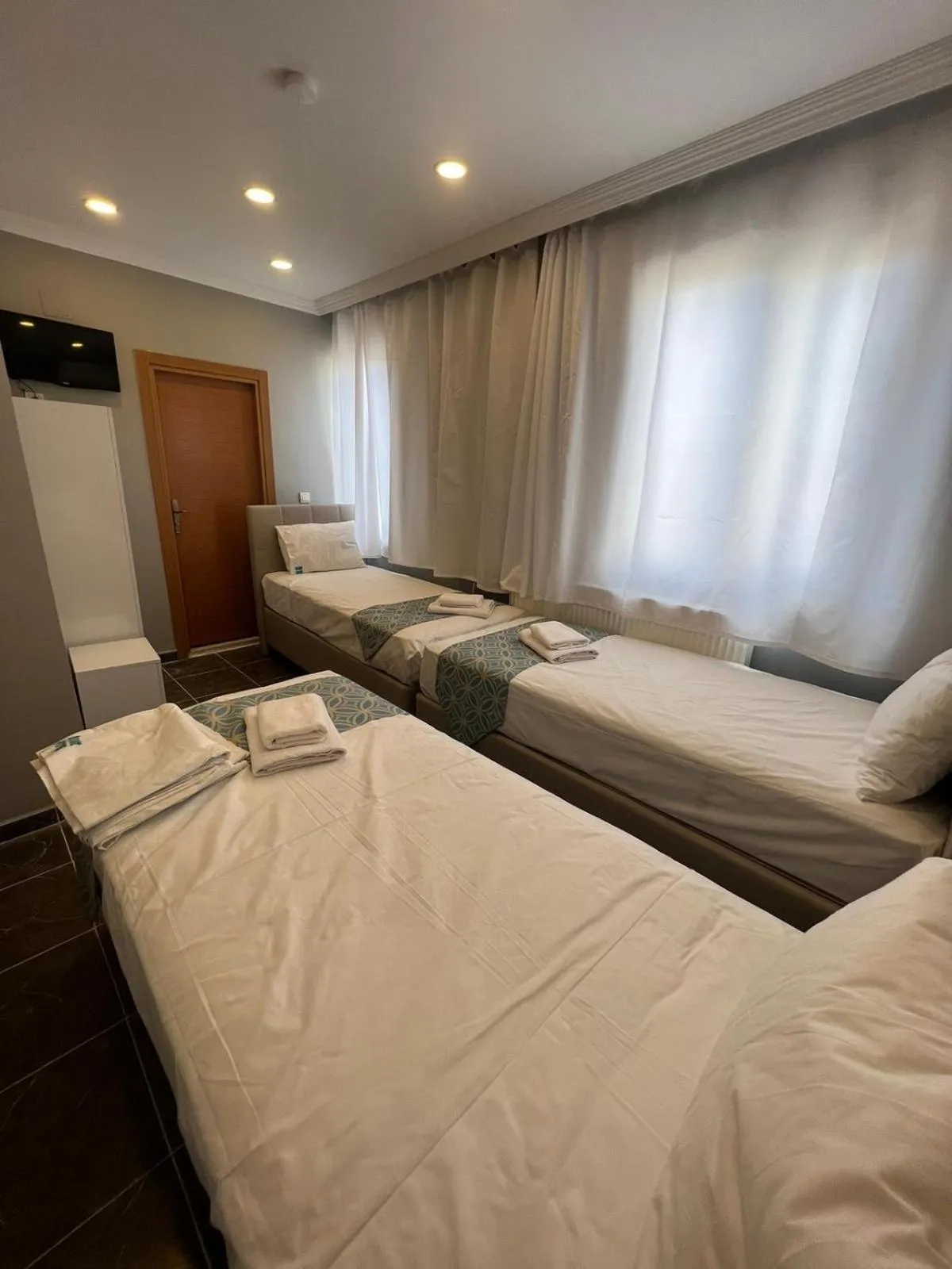 Bed in GRAND Deniz Hotel