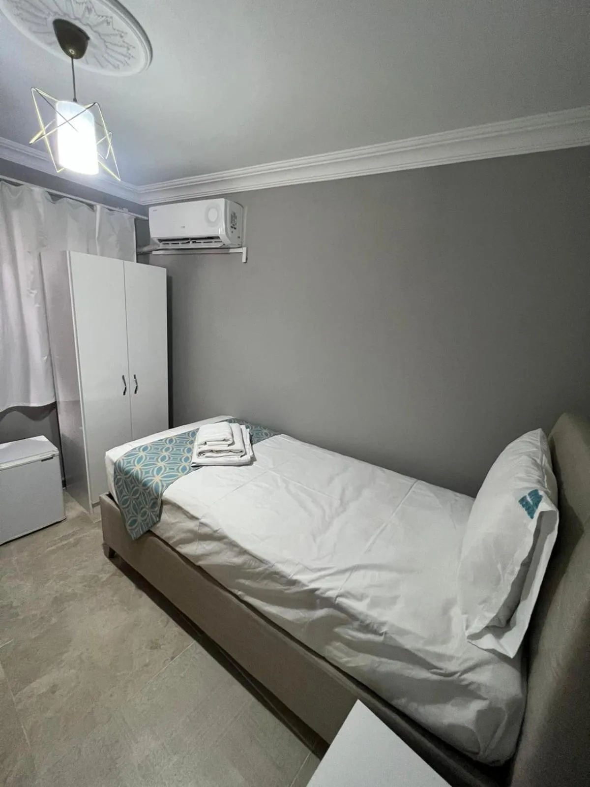 Bed in GRAND Deniz Hotel