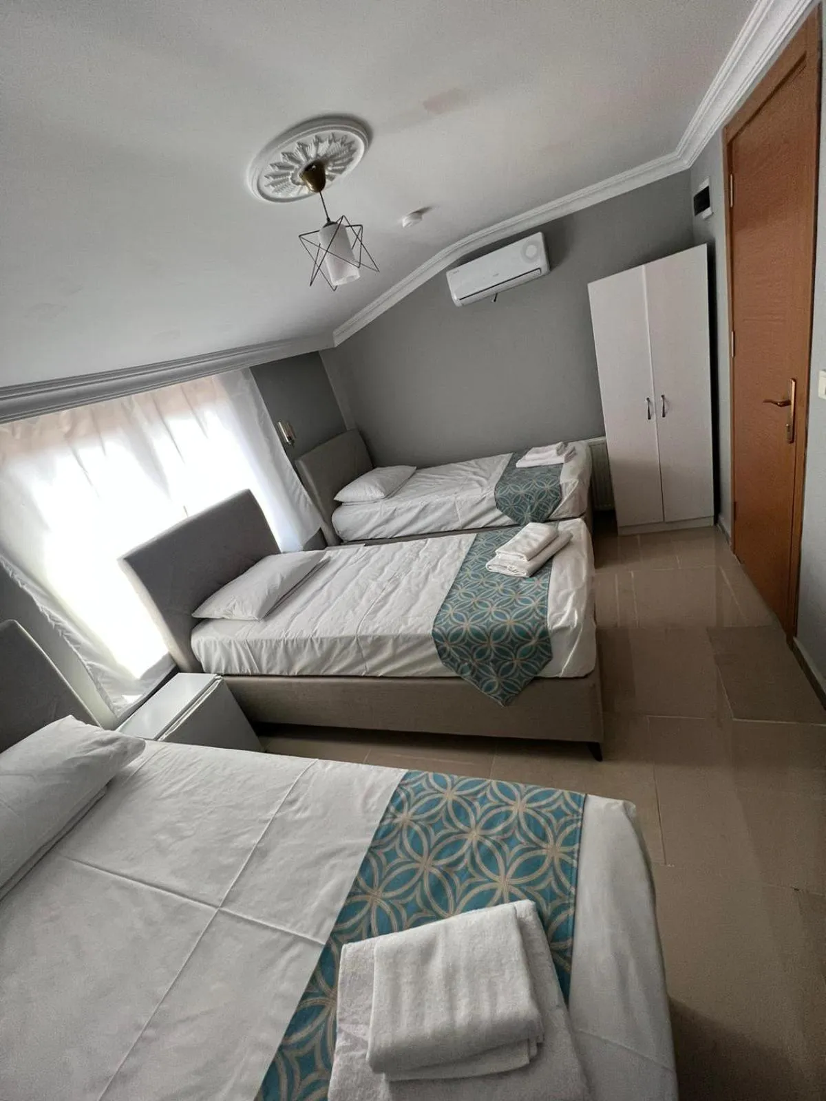 Bed in GRAND Deniz Hotel