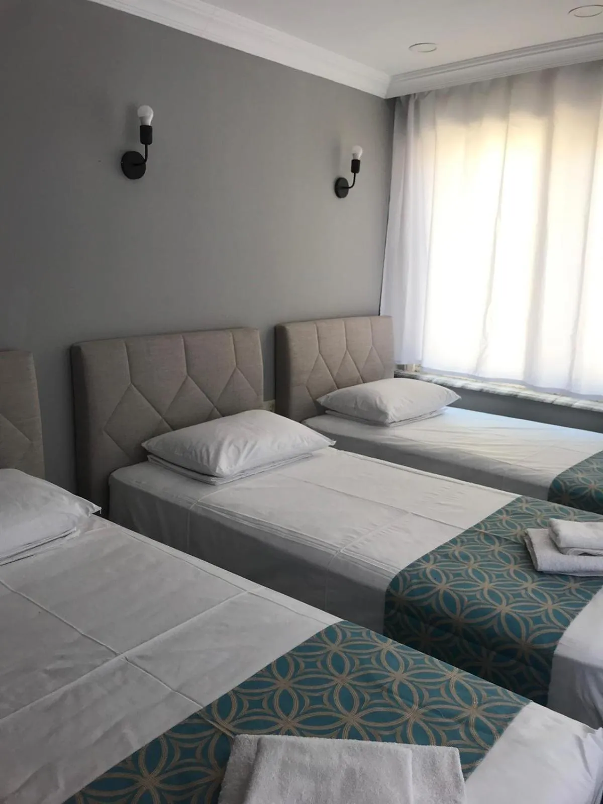 Bed in GRAND Deniz Hotel