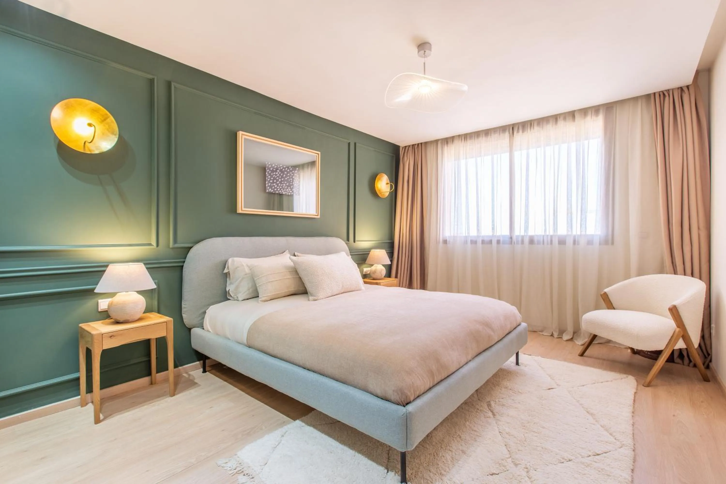 Bed in ZARI Boutique ApartHotel