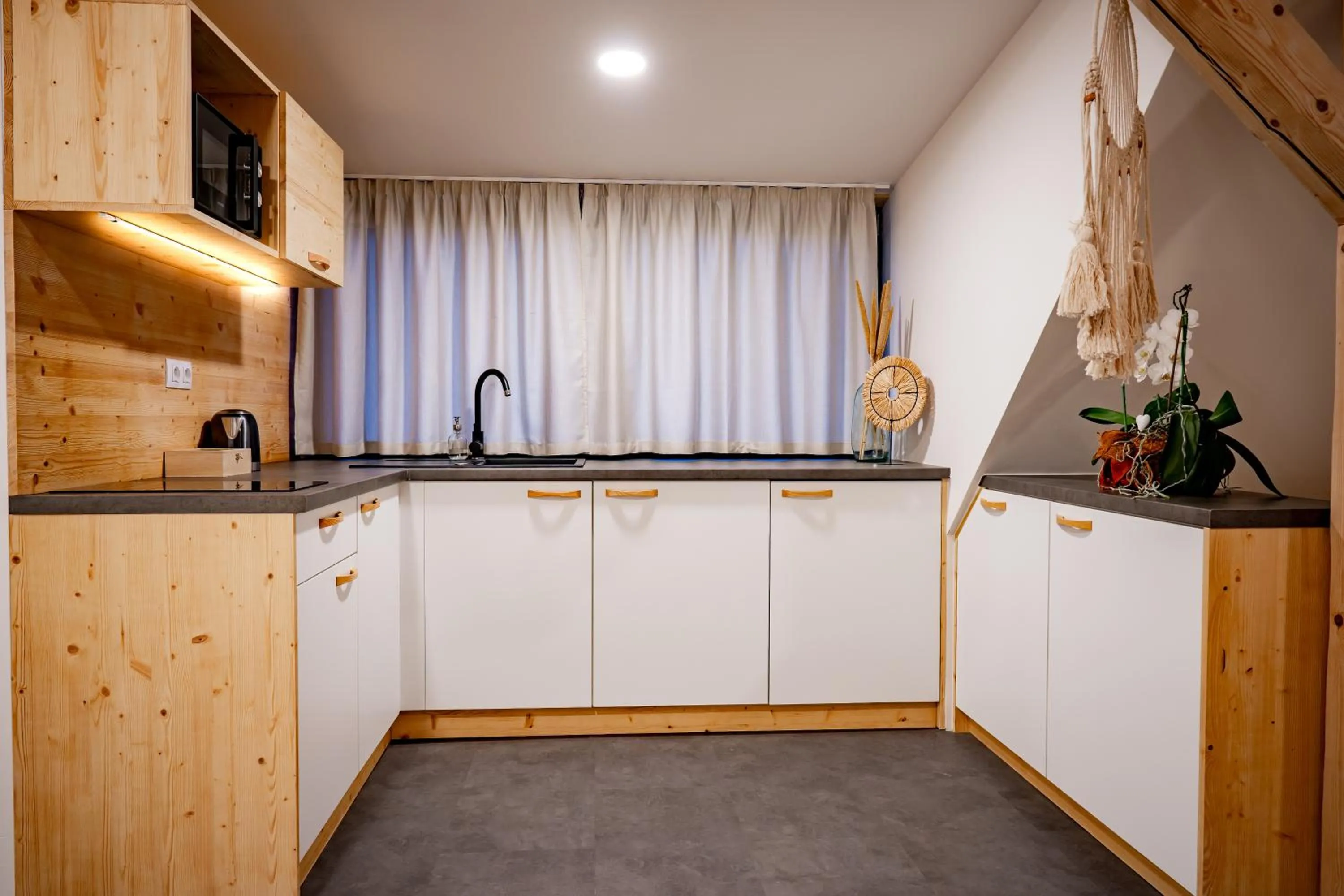 Kitchen or kitchenette in Apartmány NONE