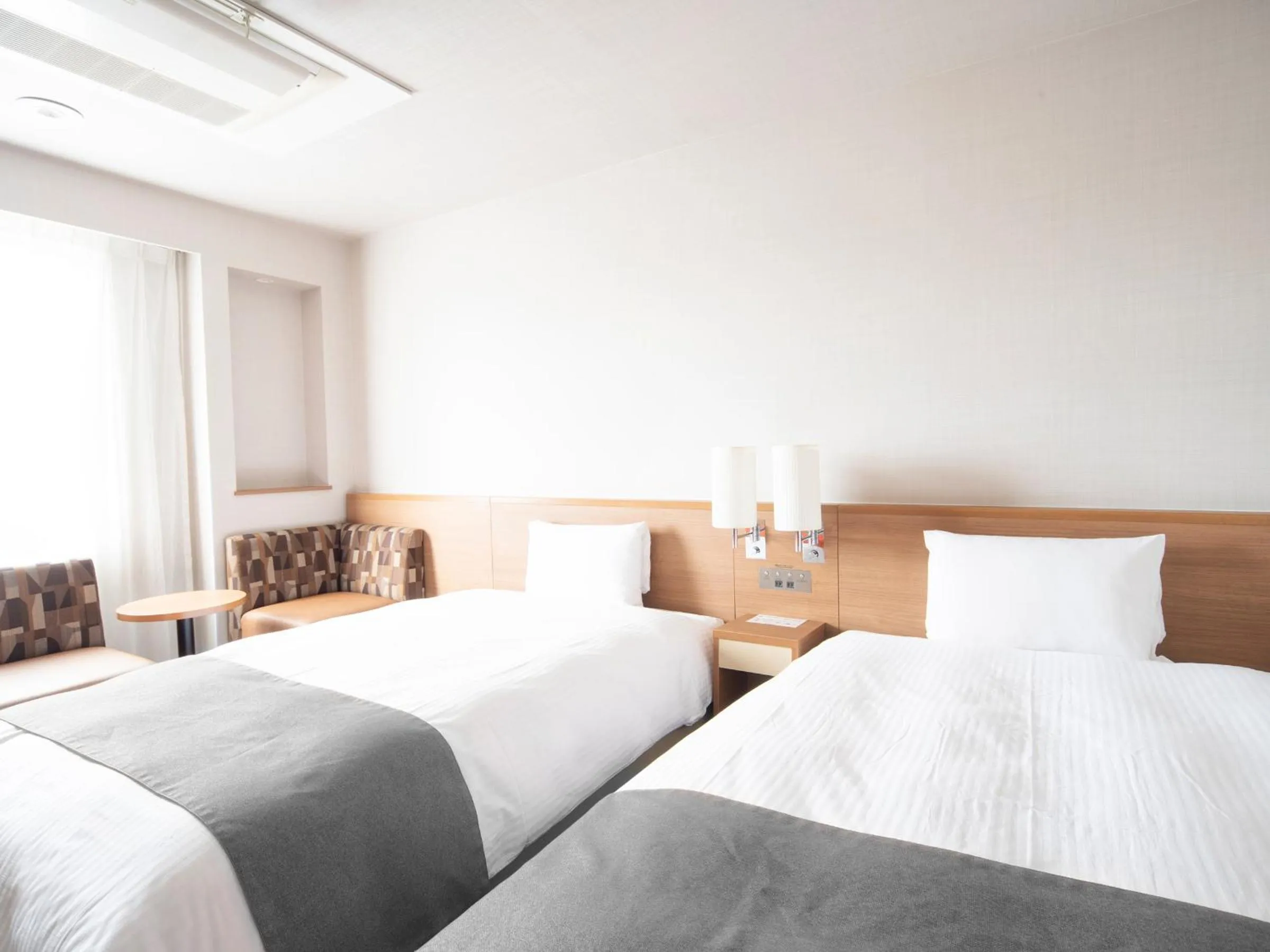 Bed in Vessel Inn Fukuyama Station