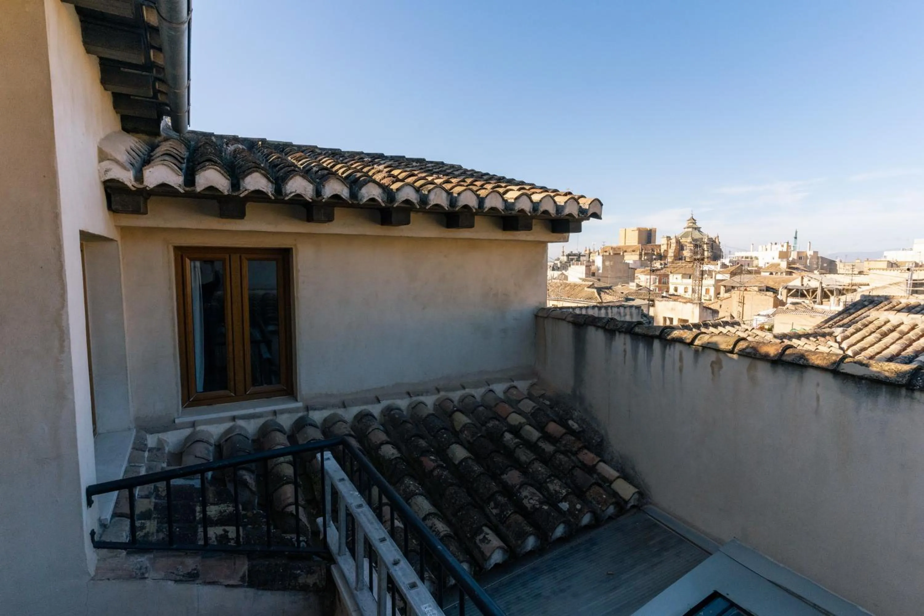 TV and multimedia in Hotel Boutique Puerta de las Granadas