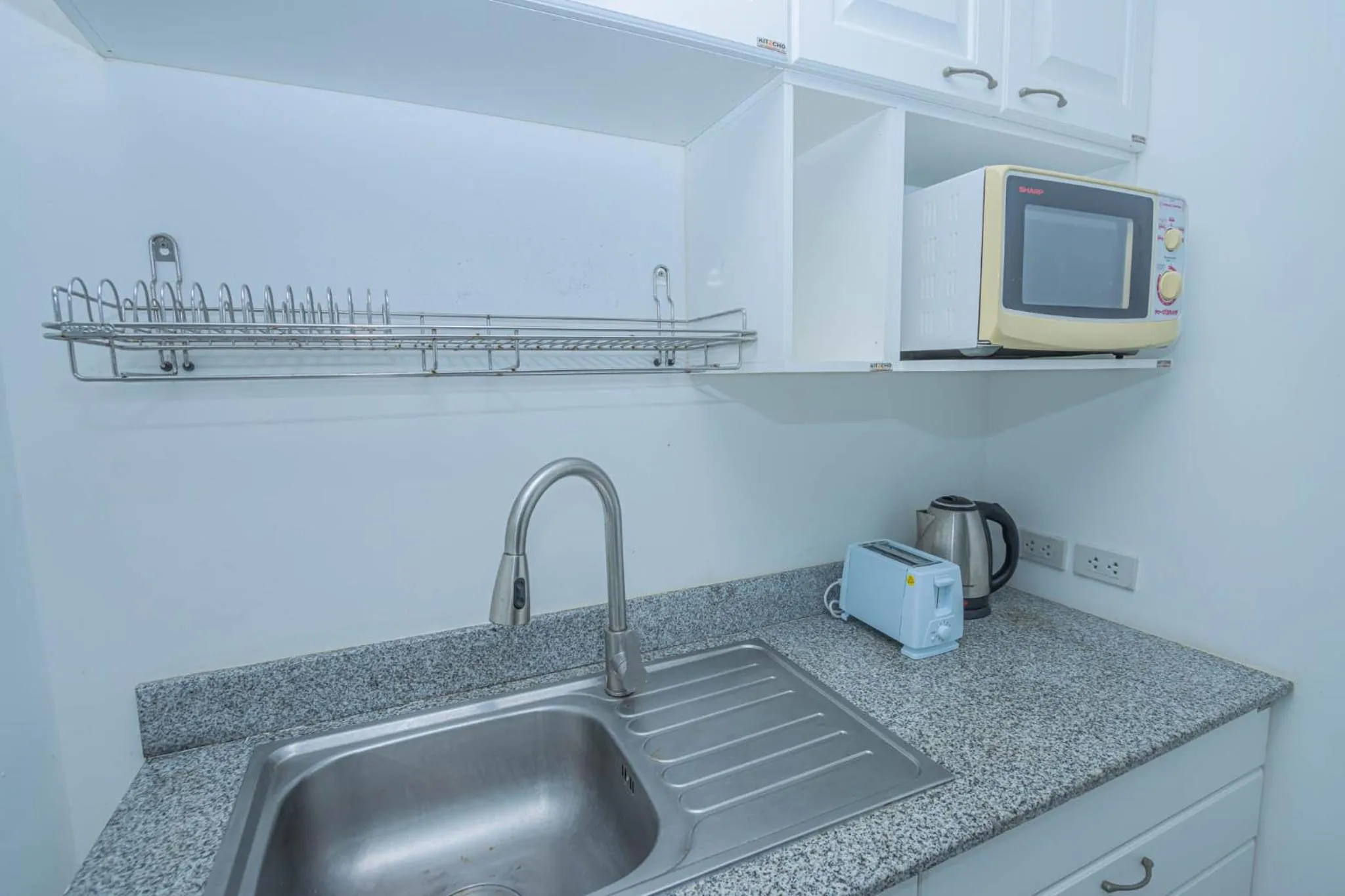 Kitchen or kitchenette in Utopia Kata By RoomQuest