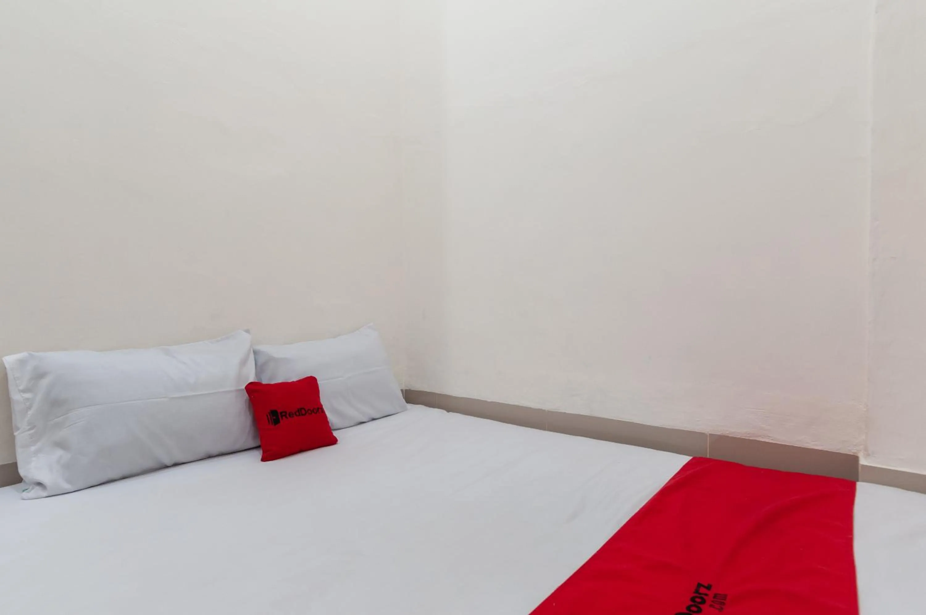 Bed in RedDoorz near UISU teladan Medan