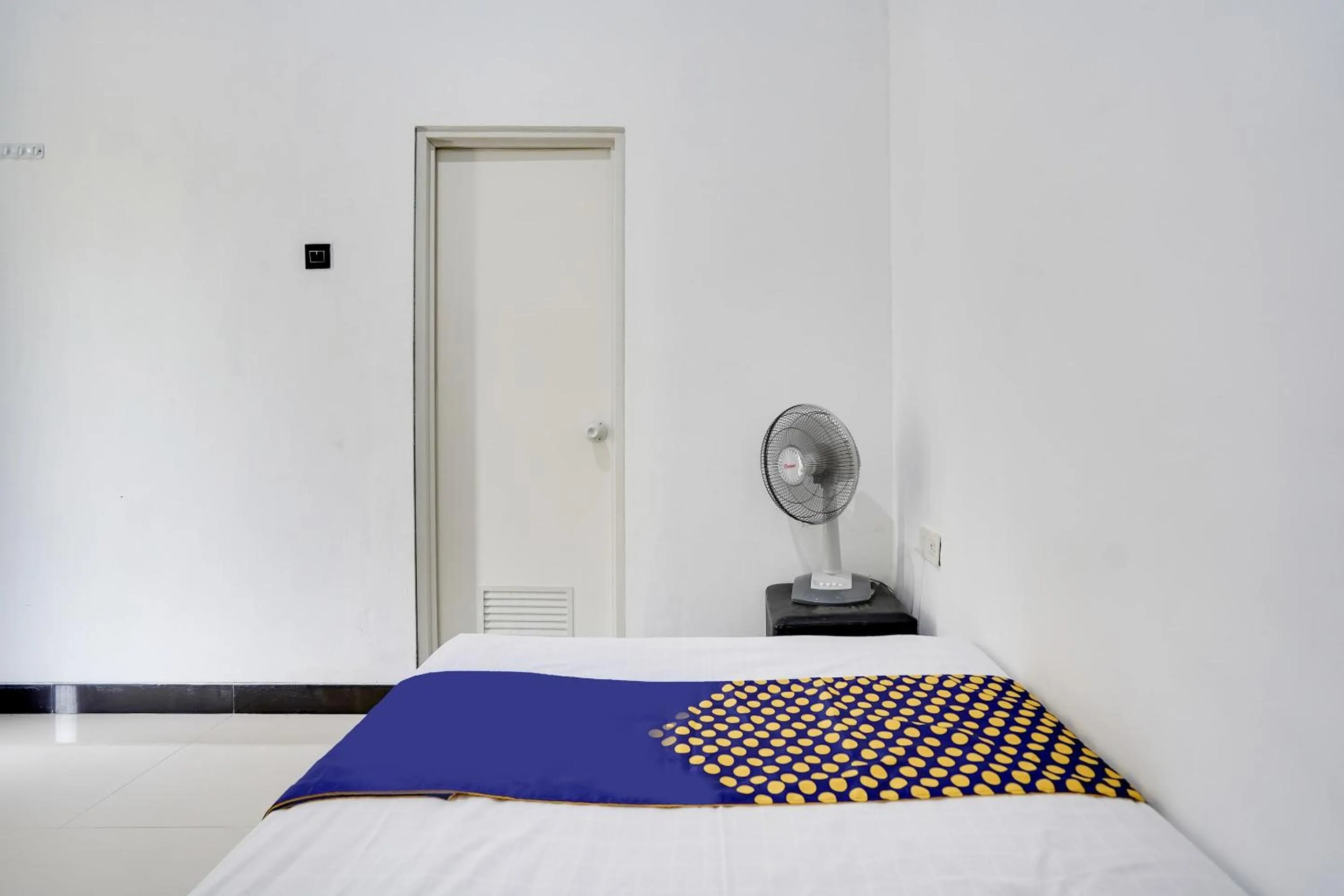 Bedroom in Hotel O Rumah Kost Gresik Syariah