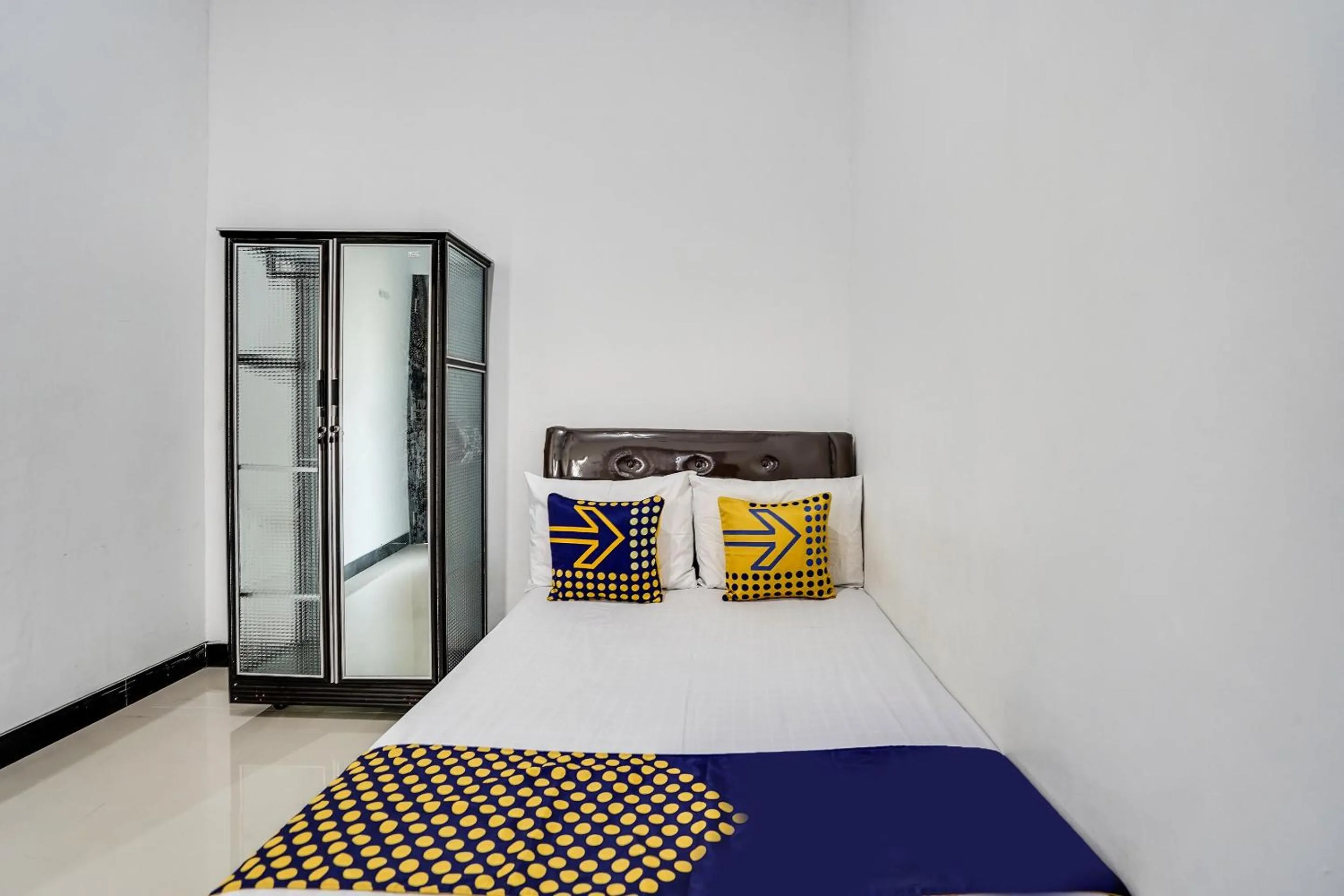 Bedroom in Hotel O Rumah Kost Gresik Syariah