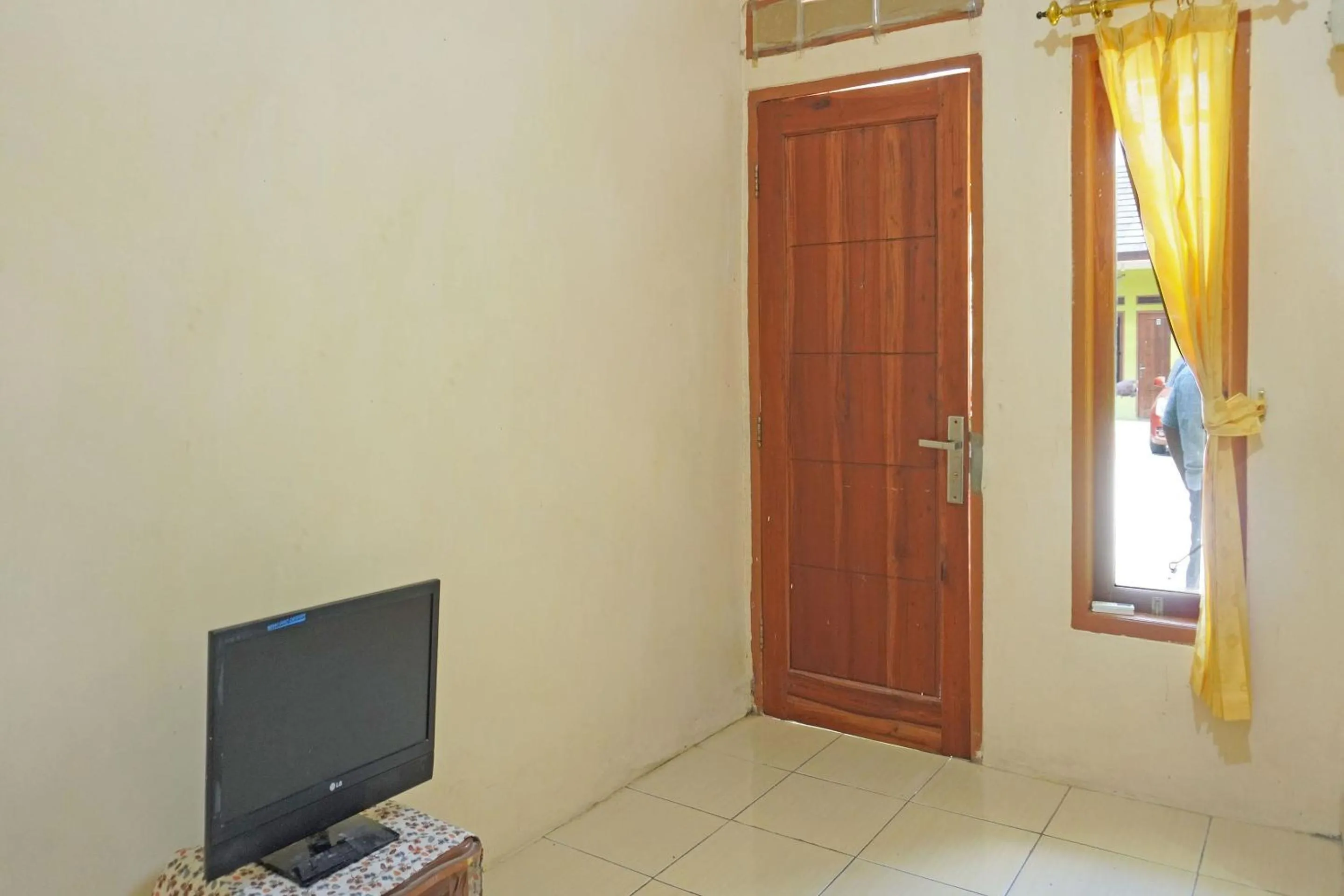 Bedroom in OYO 91762 Green Home Stay Syariah