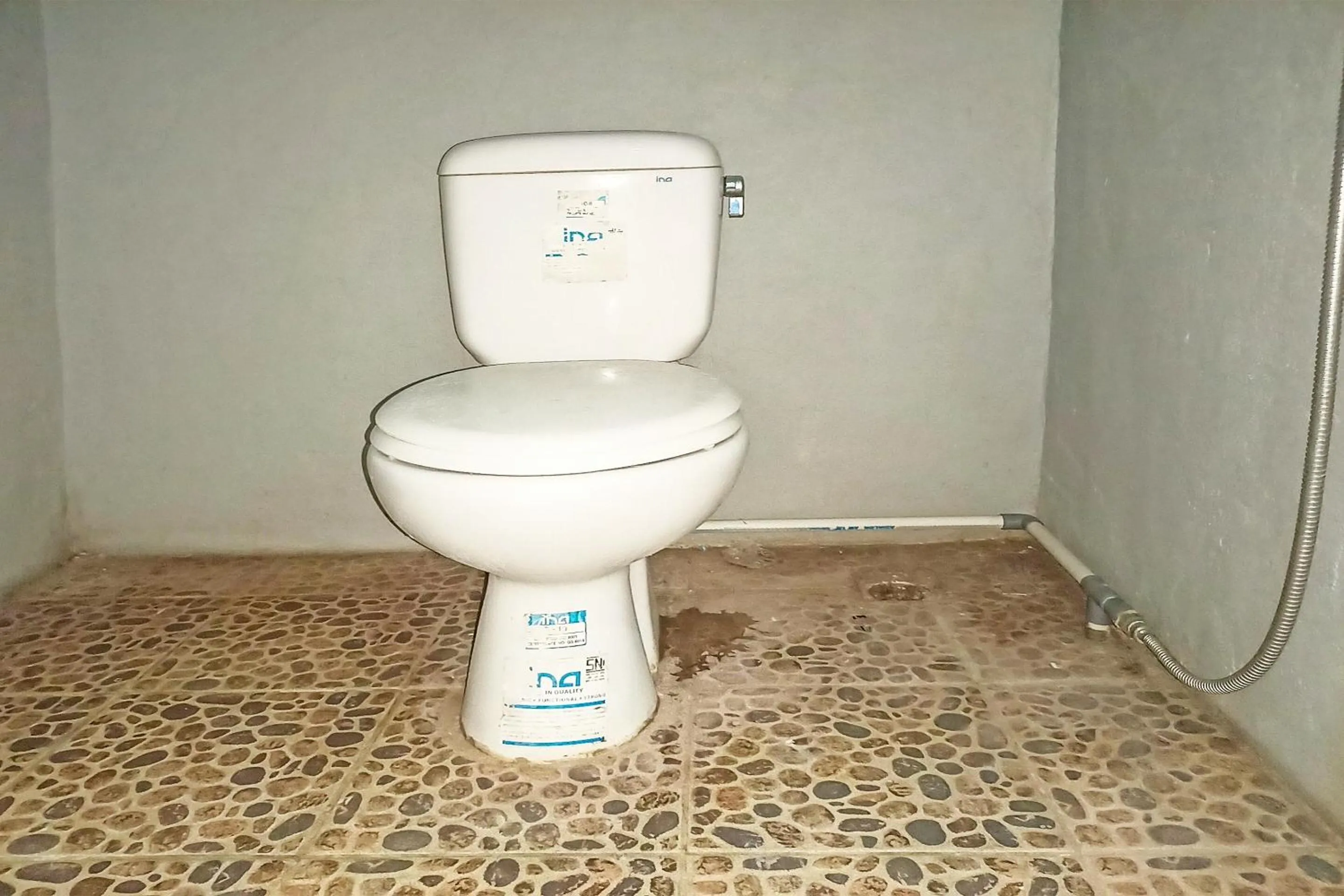 Bathroom in OYO 91768 Hotel Tanjung Permai