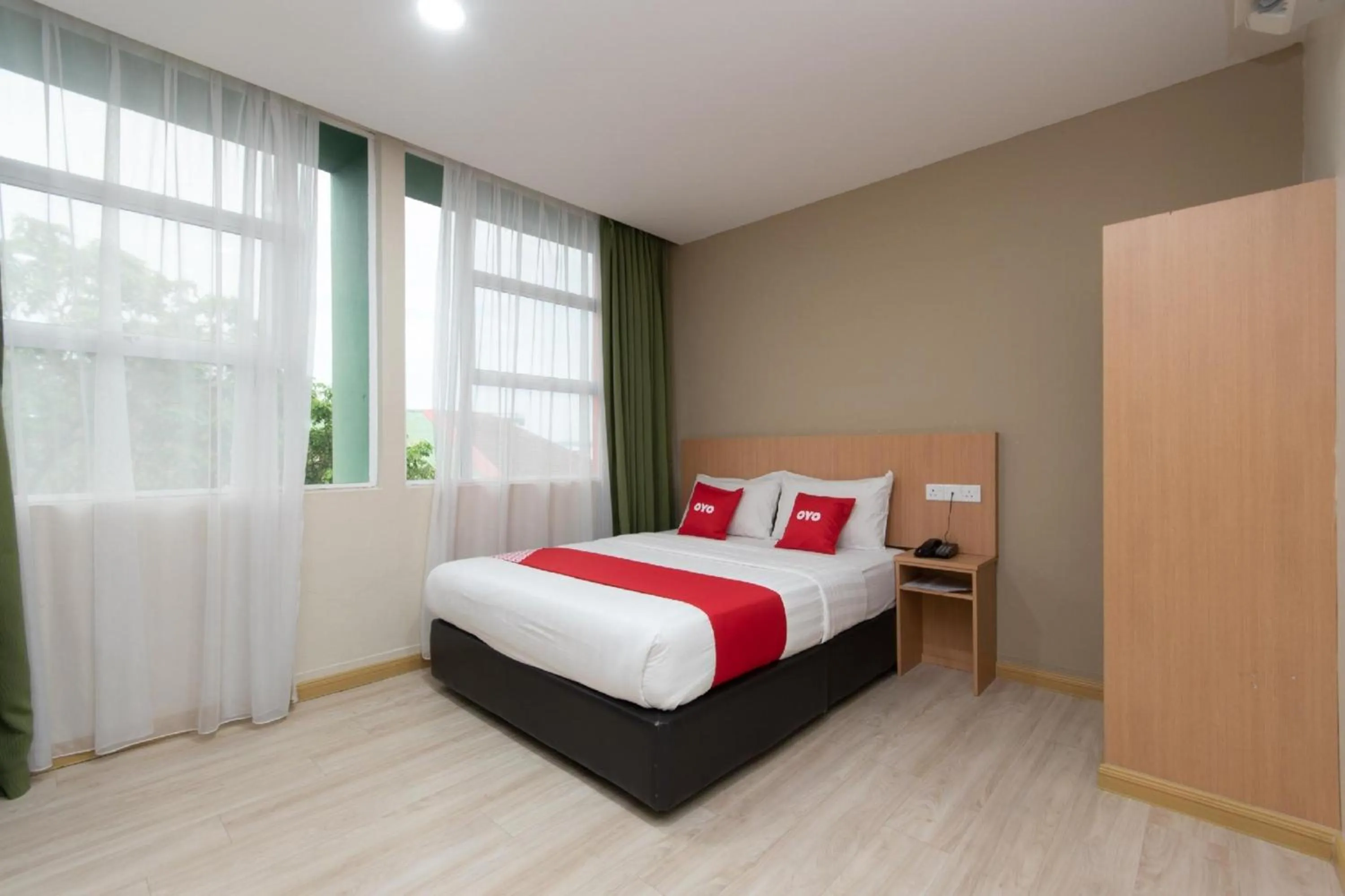 Photo of the whole room in Capital O 89344 Labuan Avenue Hotel