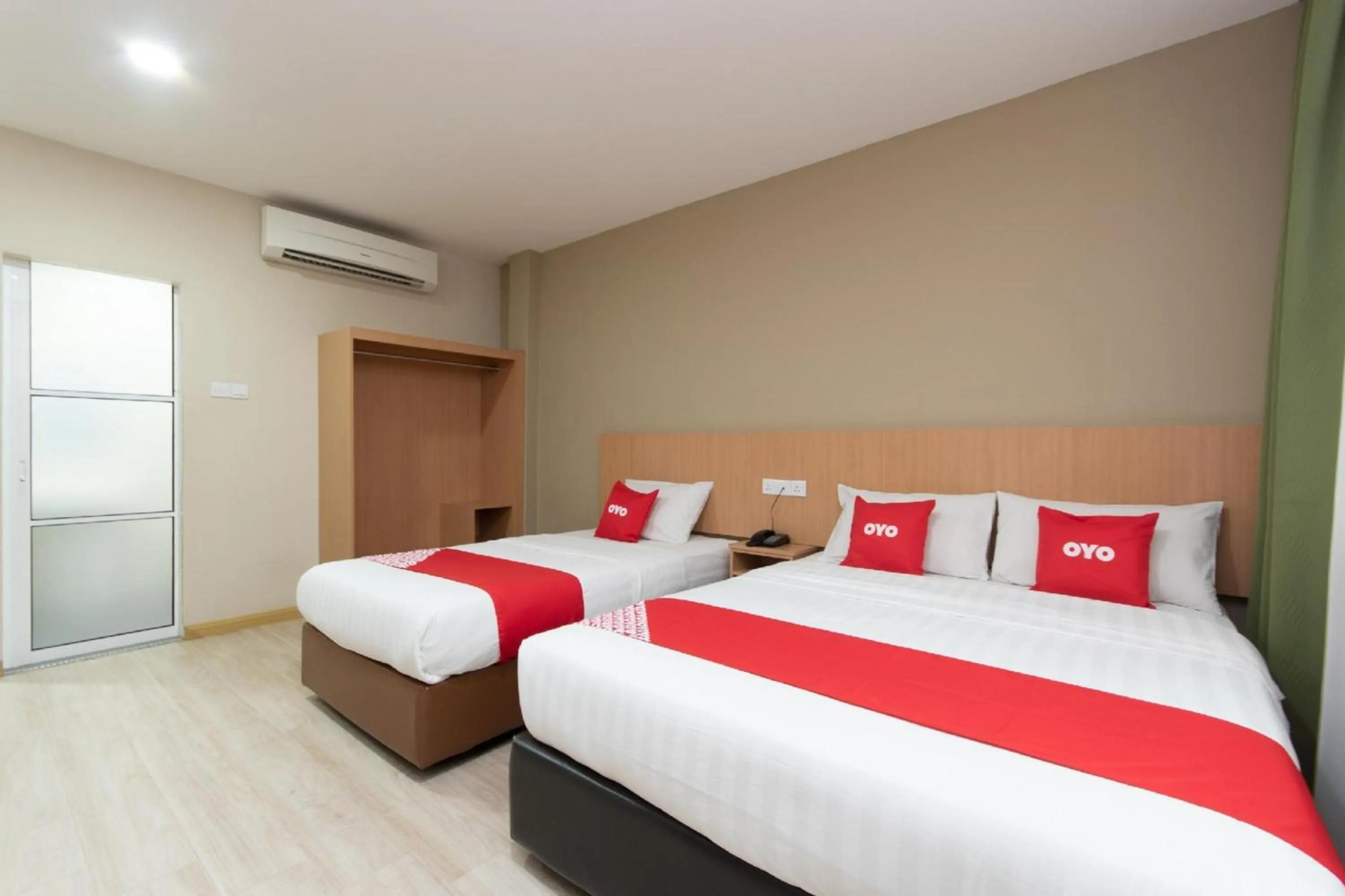 Photo of the whole room in Capital O 89344 Labuan Avenue Hotel