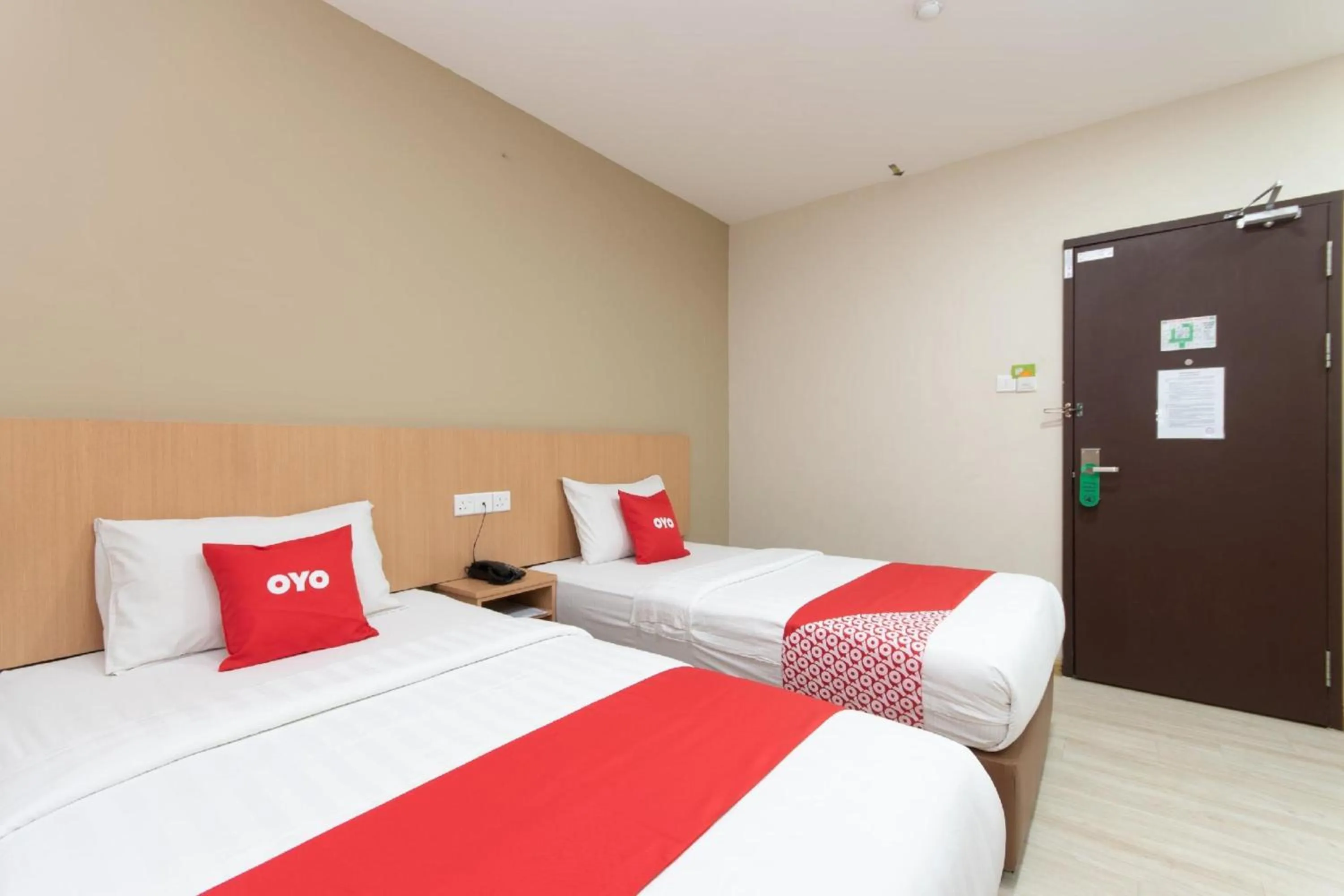 Photo of the whole room in Capital O 89344 Labuan Avenue Hotel