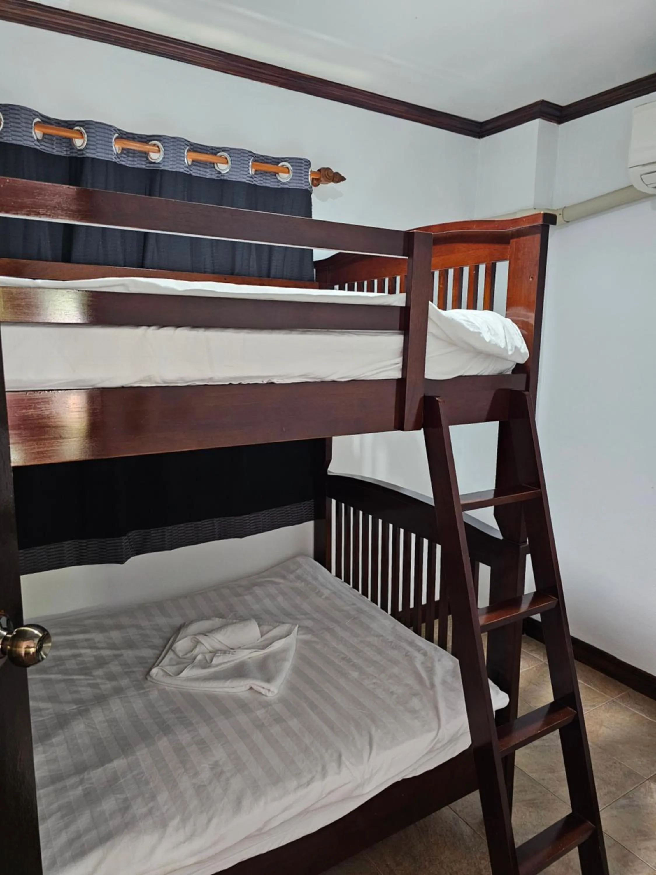 Bed in Sai Rougn apartment