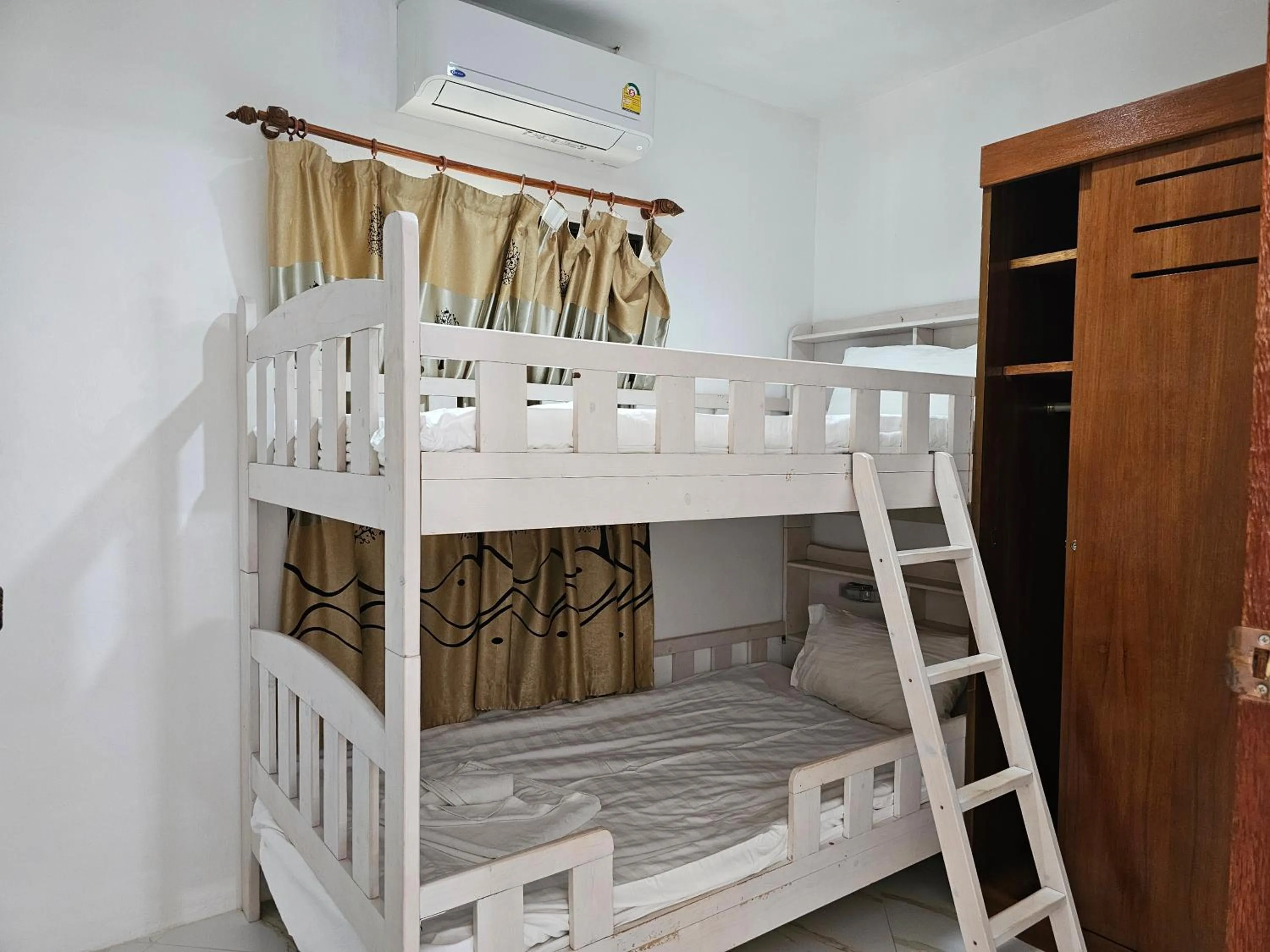 Bed in Sai Rougn apartment