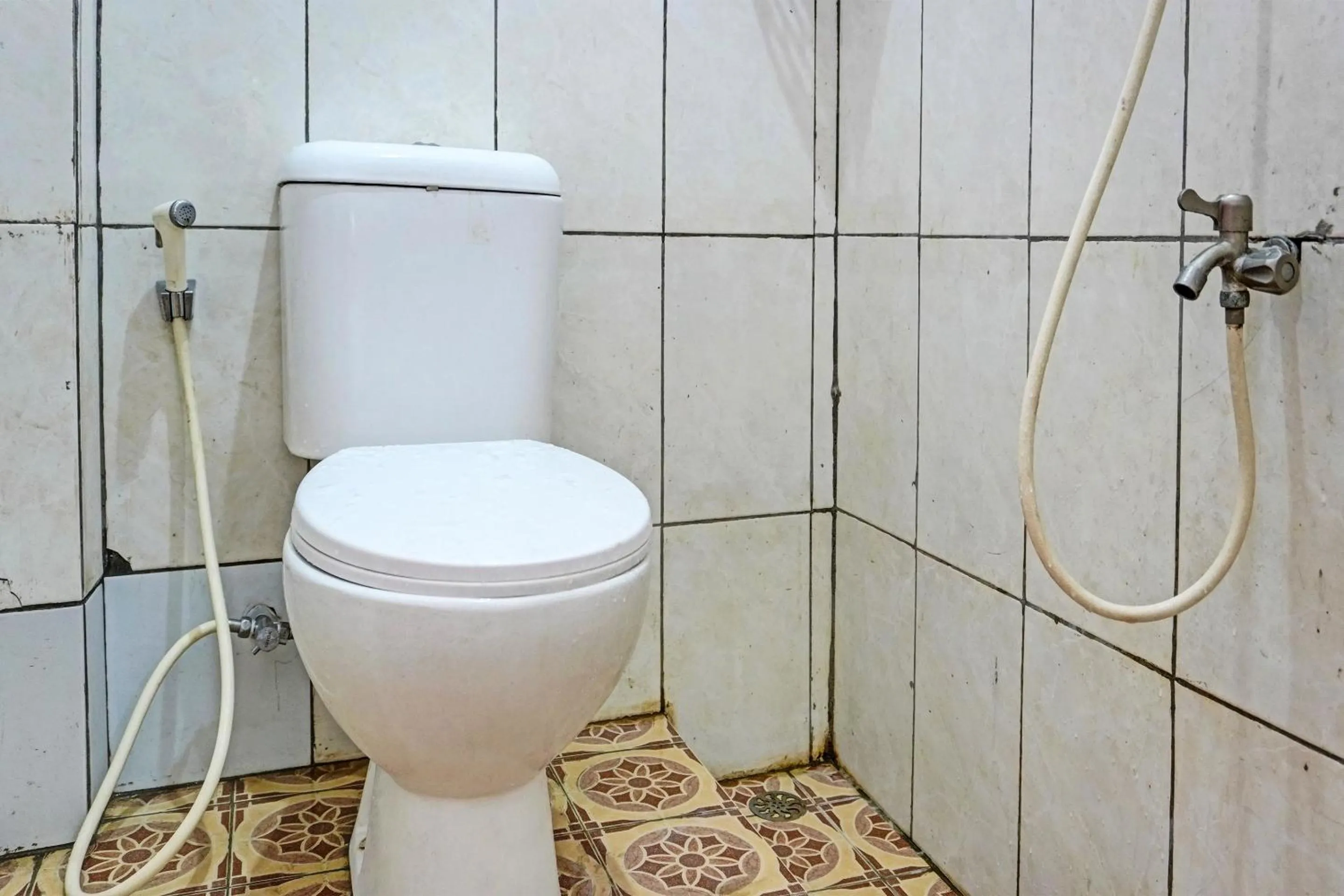 Bathroom in OYO 91796 Guest House Ghalta Syariah