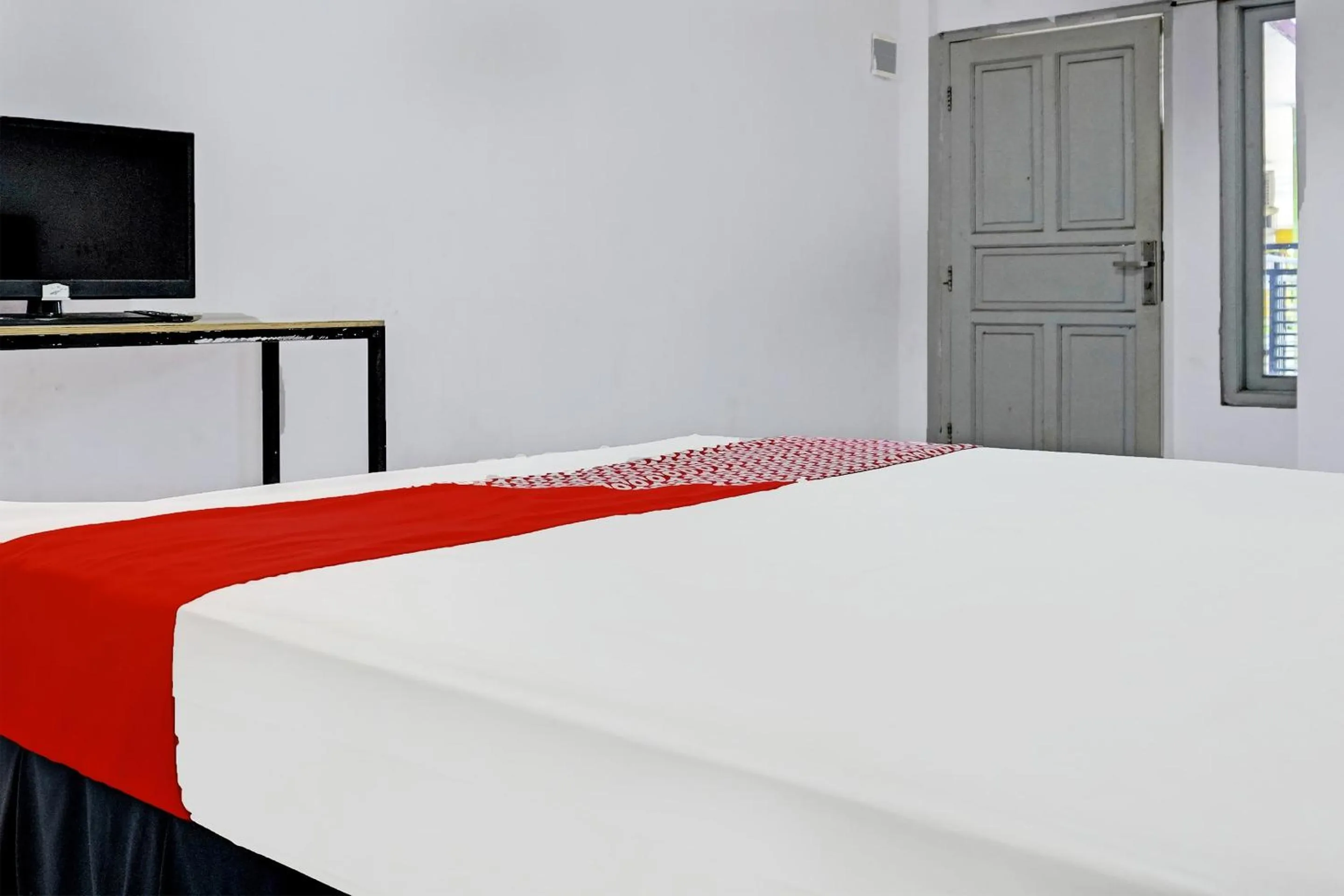 Bedroom in OYO 91796 Guest House Ghalta Syariah