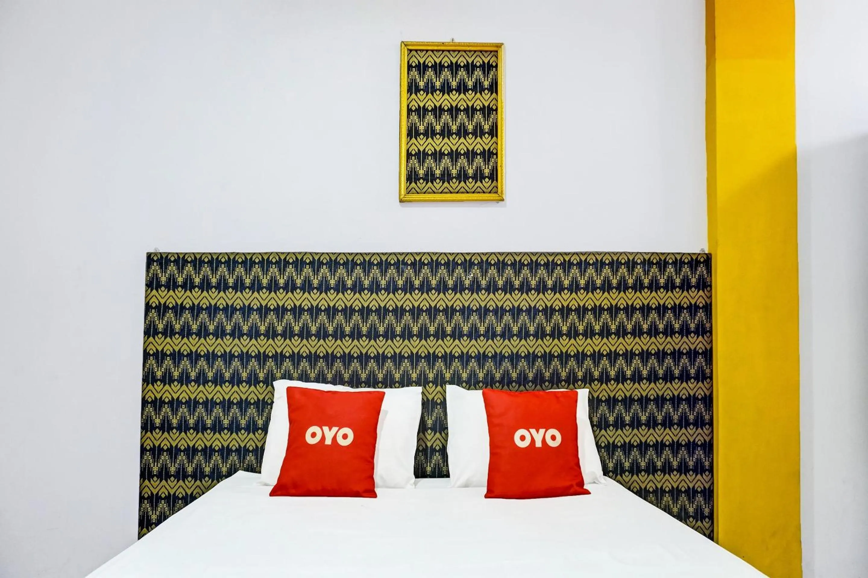 Bedroom in OYO 91796 Guest House Ghalta Syariah