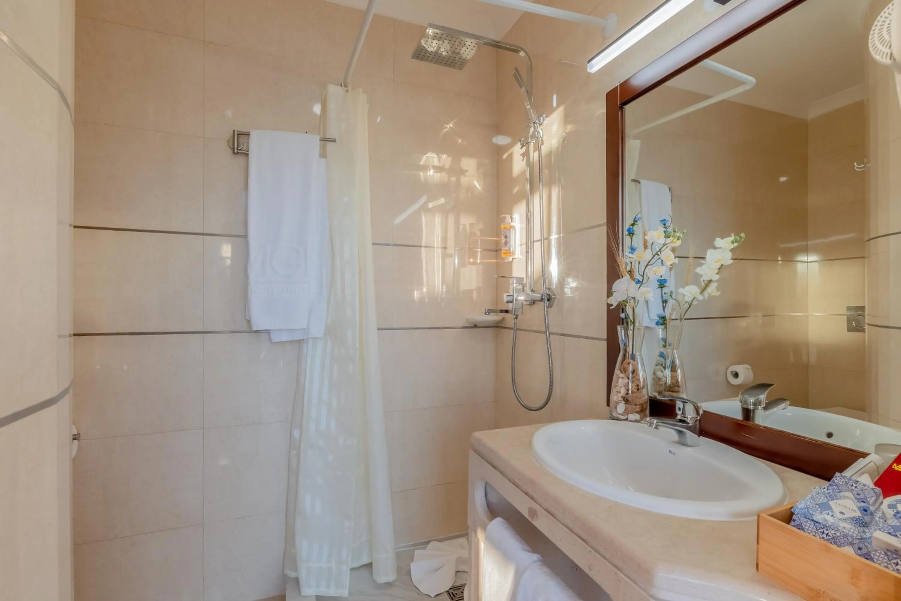 Shower in Monicca Collection Suites and Residences