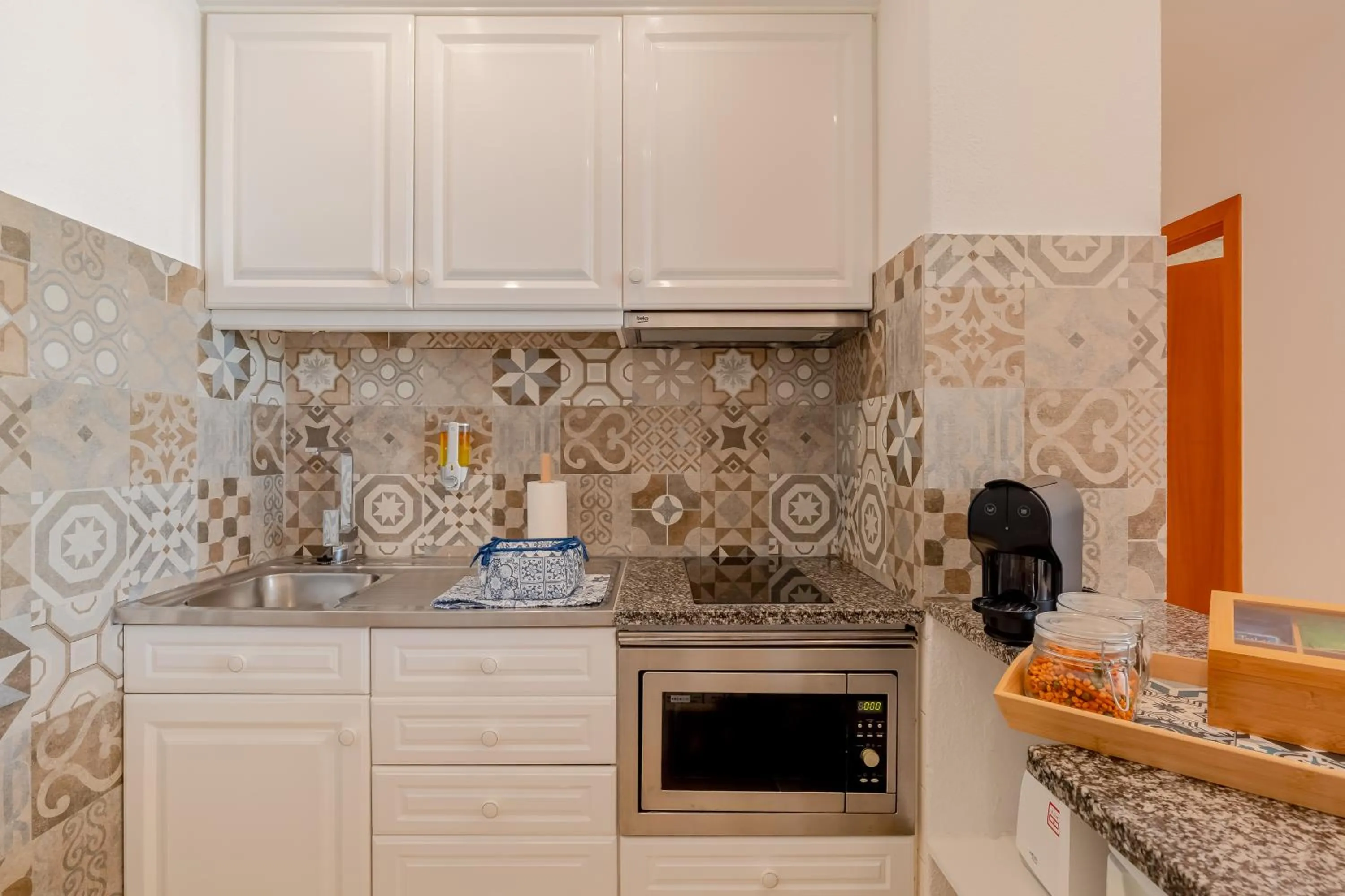 Kitchen or kitchenette in Monicca Collection Suites and Residences