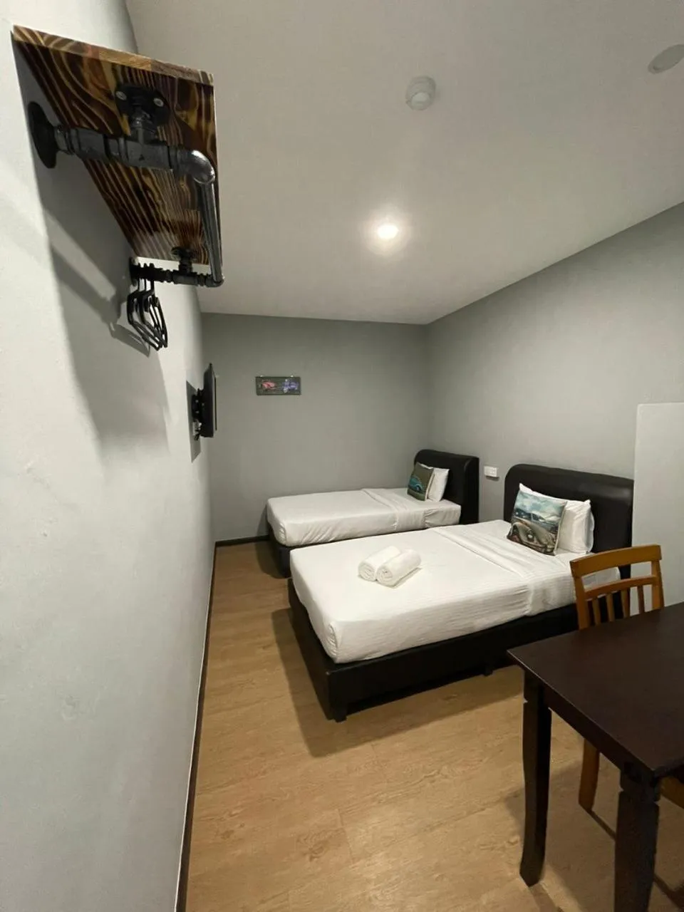 Bed in RNK BoutiQue HOTEL