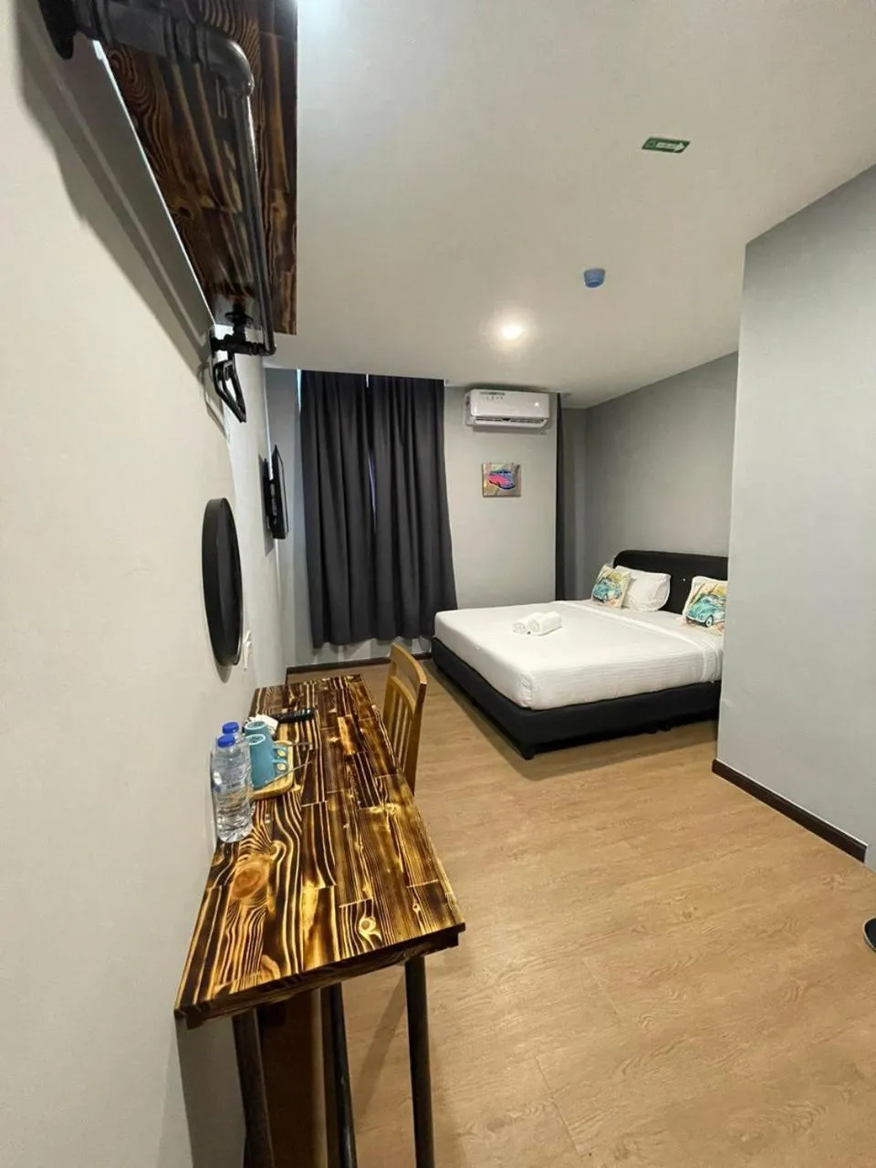 Bed in RNK BoutiQue HOTEL