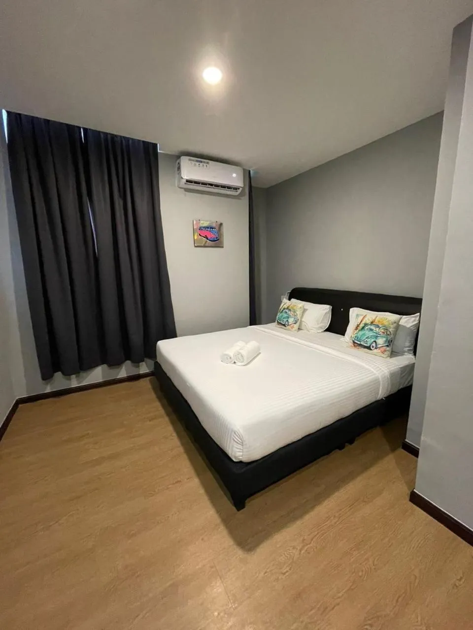 Bed in RNK BoutiQue HOTEL