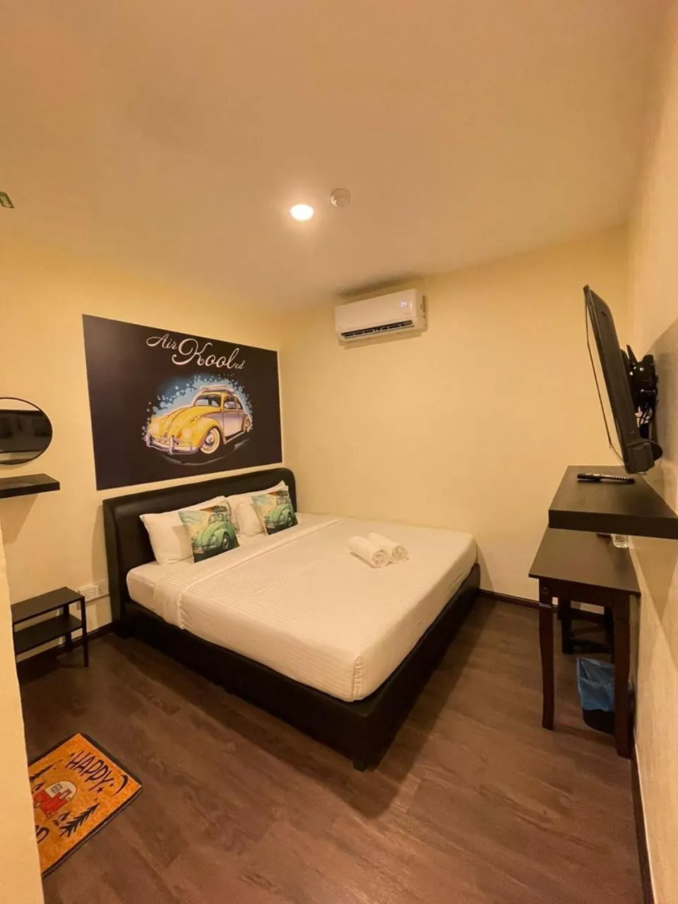 Bed in RNK BoutiQue HOTEL