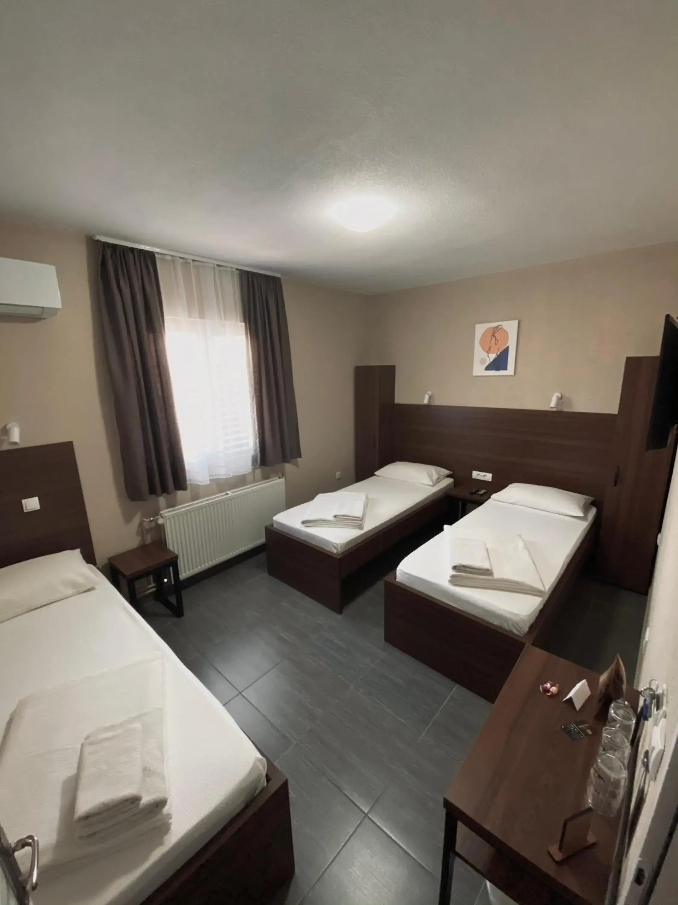 Classic Triple Room in Hotel Djerdan Classic Triple Room in Hotel Djerdan