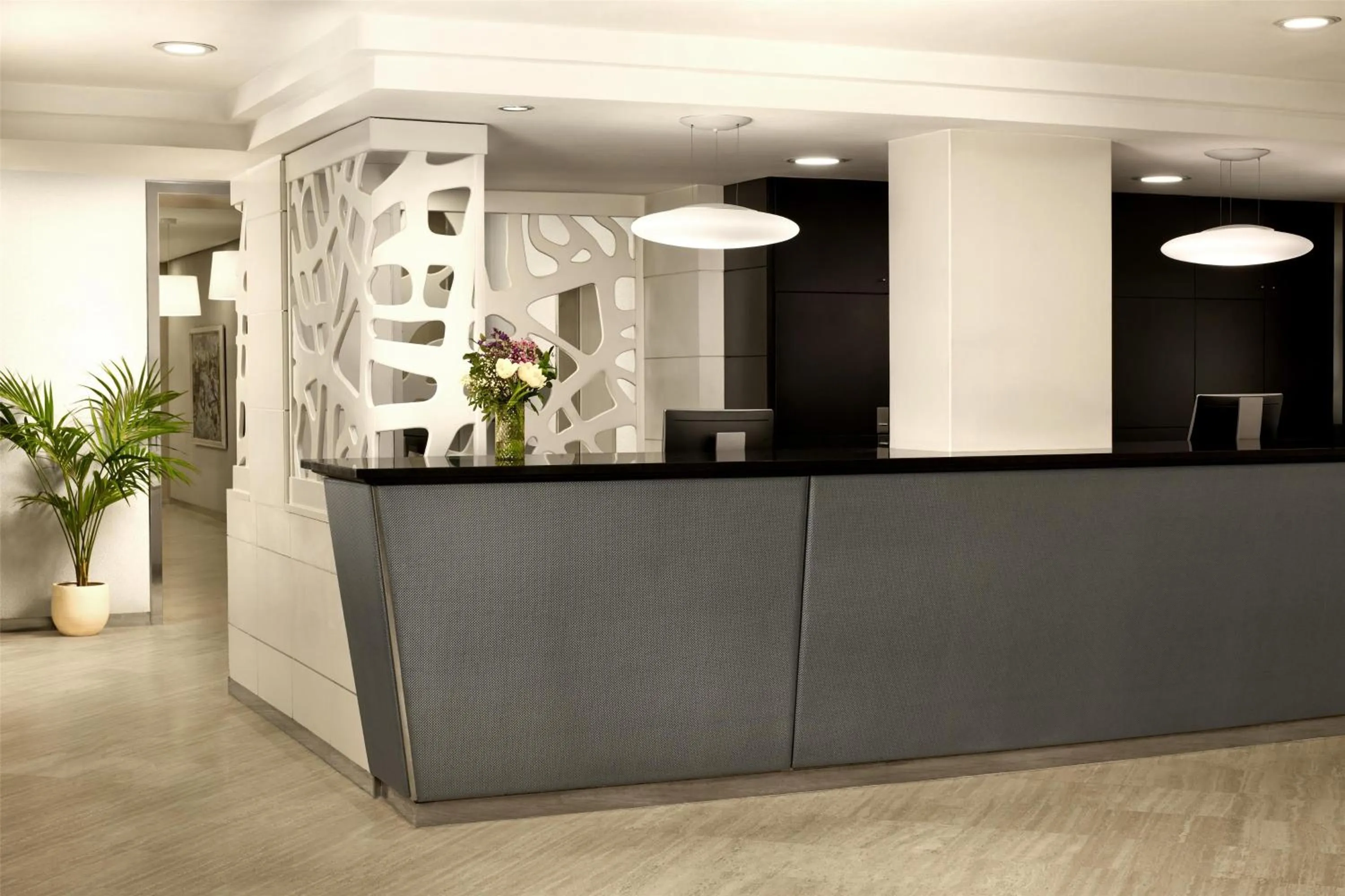 Lobby or reception in NH Barcelona Stadium