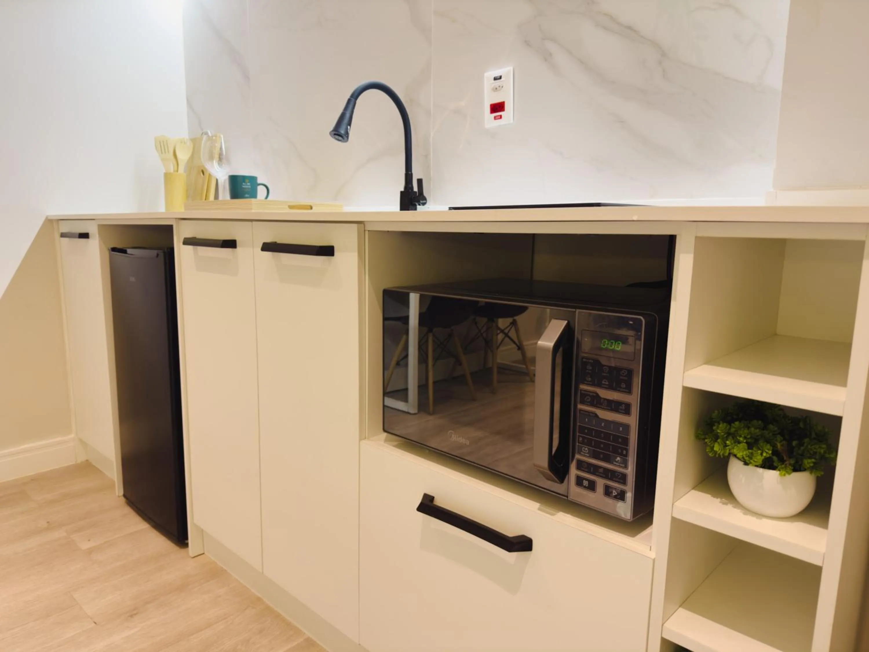 Kitchen or kitchenette in Apê Paulista Alameda Santos