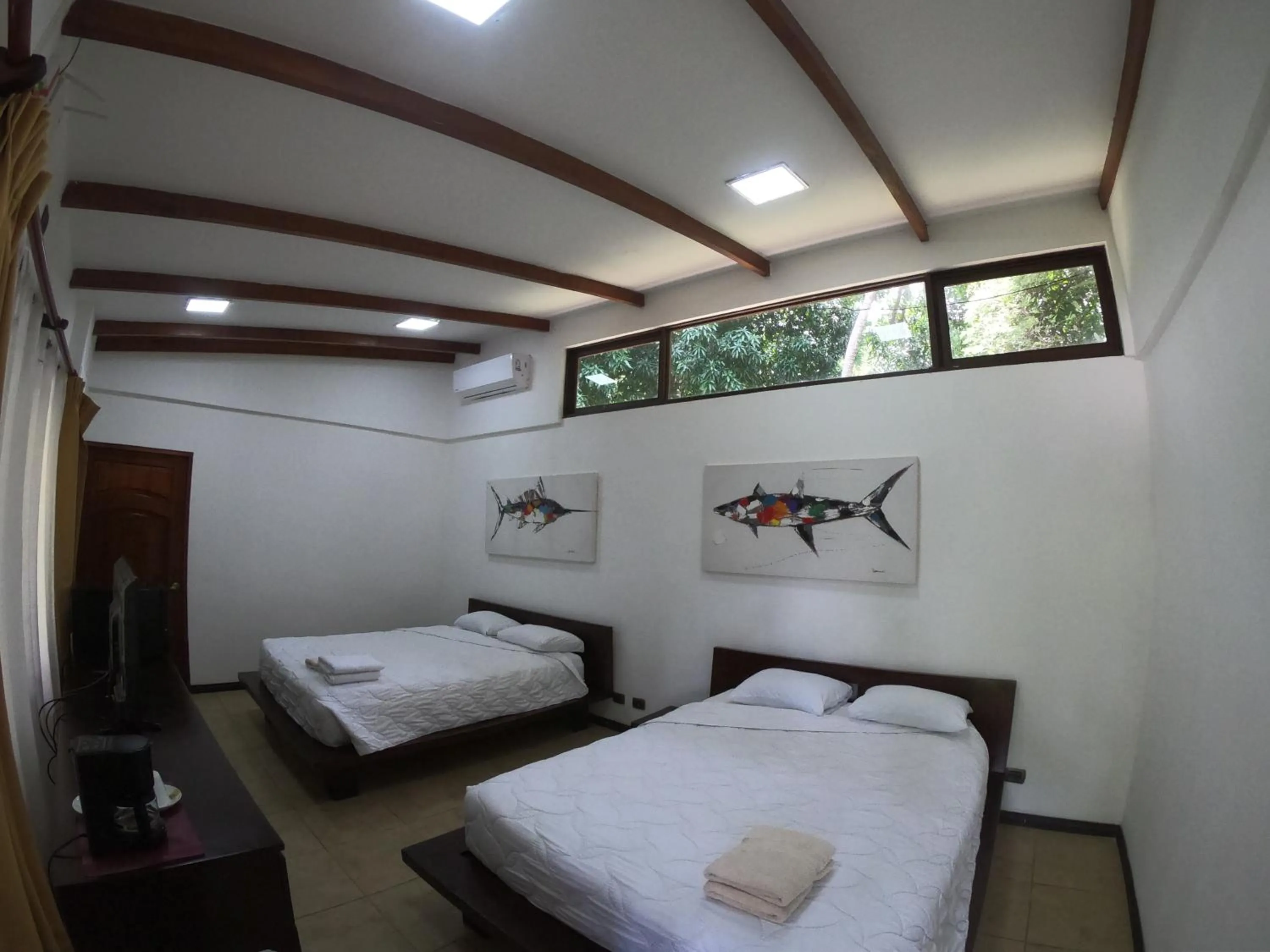 Property building in Café de Playa Beach Front Hotel