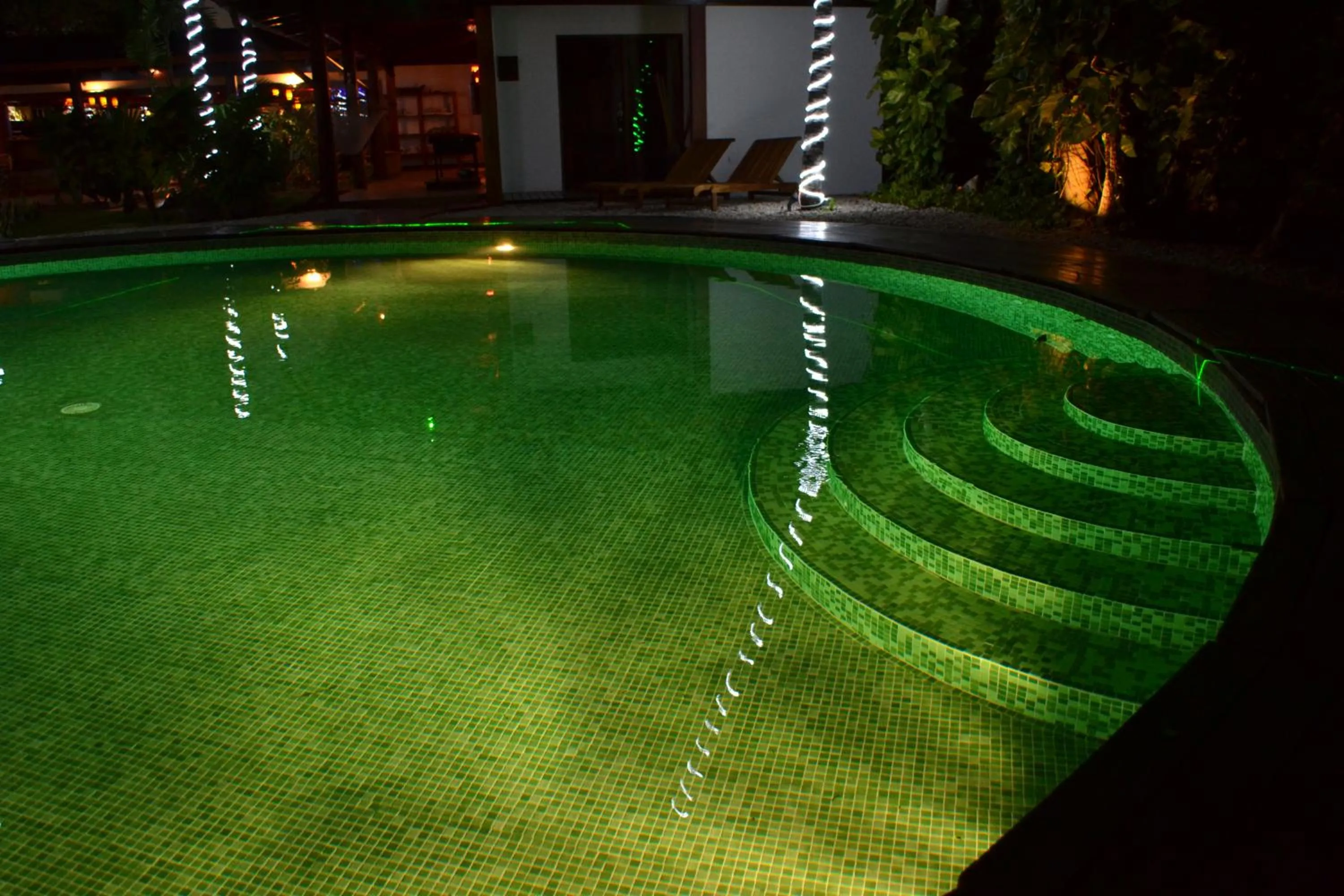 Swimming pool in Café de Playa Beach Front Hotel