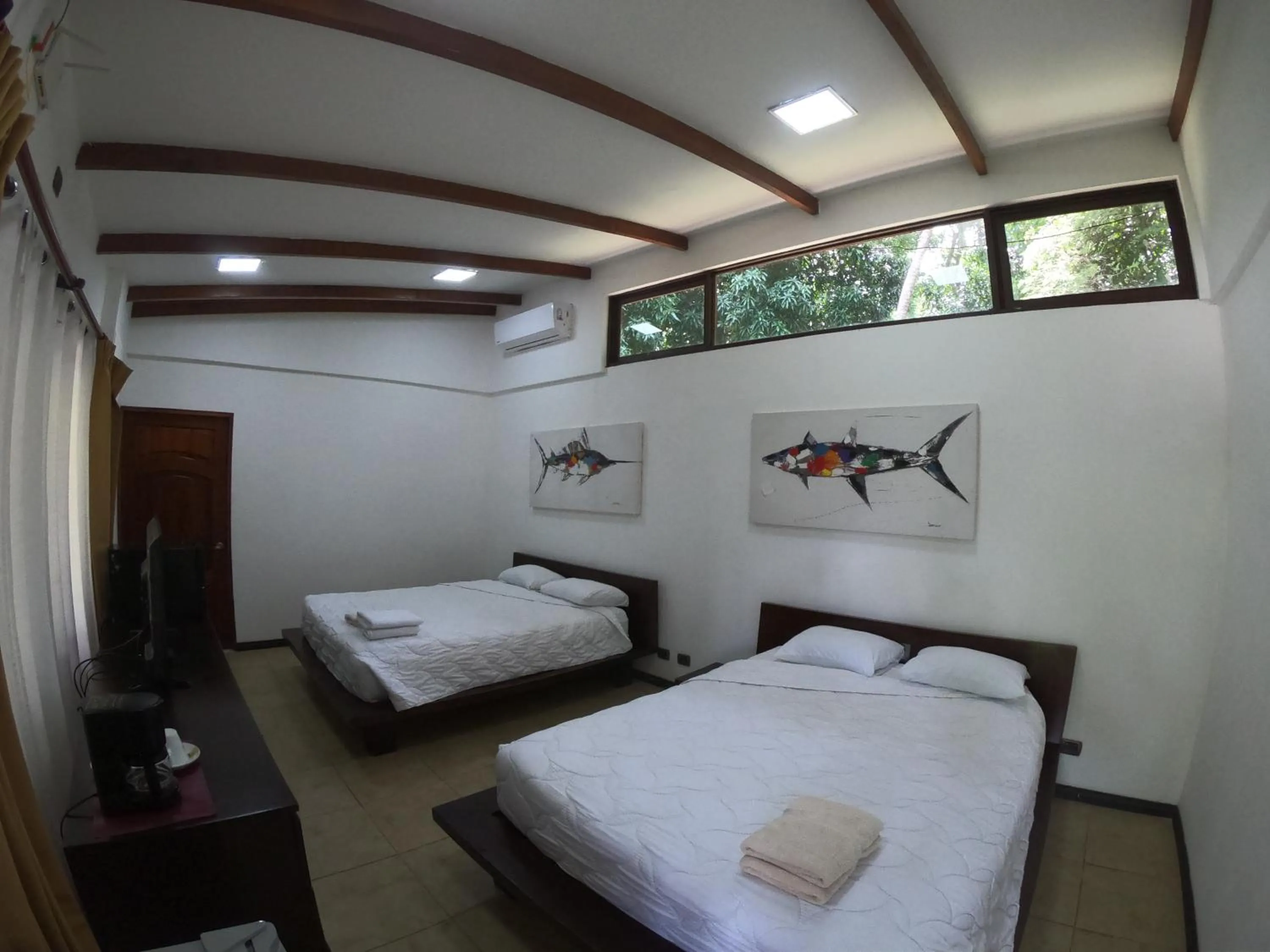 Property building in Café de Playa Beach Front Hotel