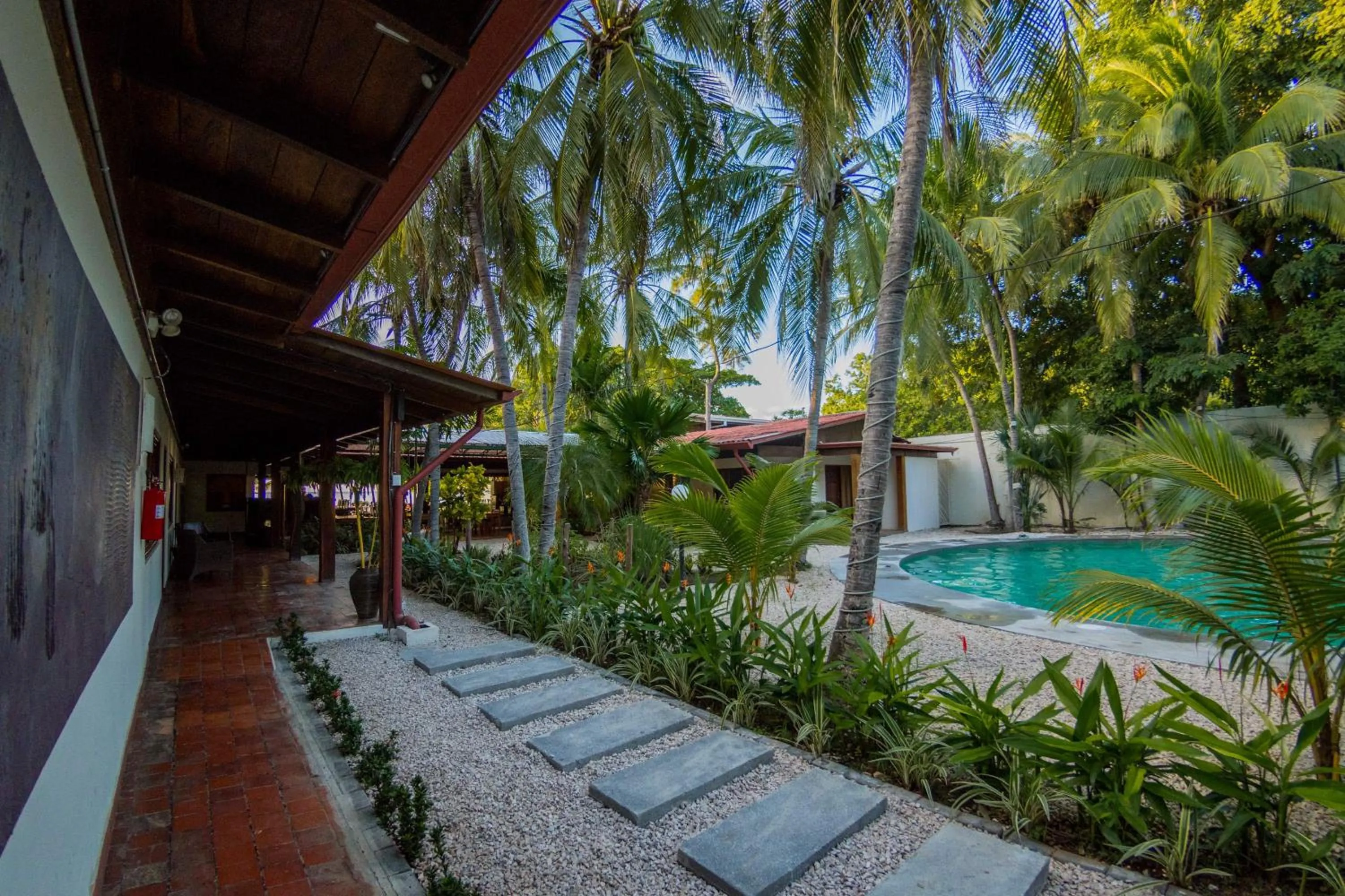 Pool view in Café de Playa Beach Front Hotel