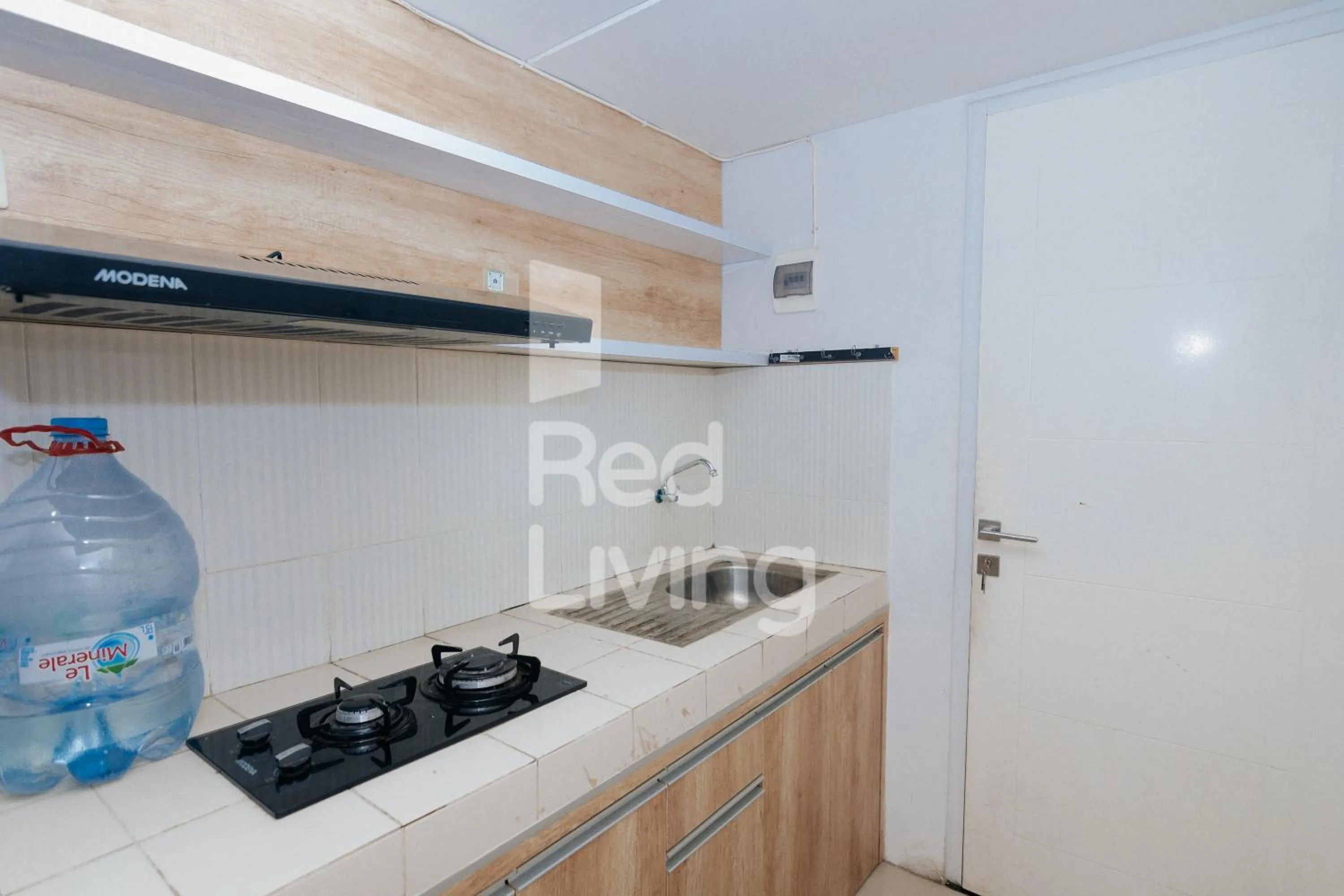 Kitchen or kitchenette in Redliving Apartemen Grand Sentraland - AT Properti Tower Pink