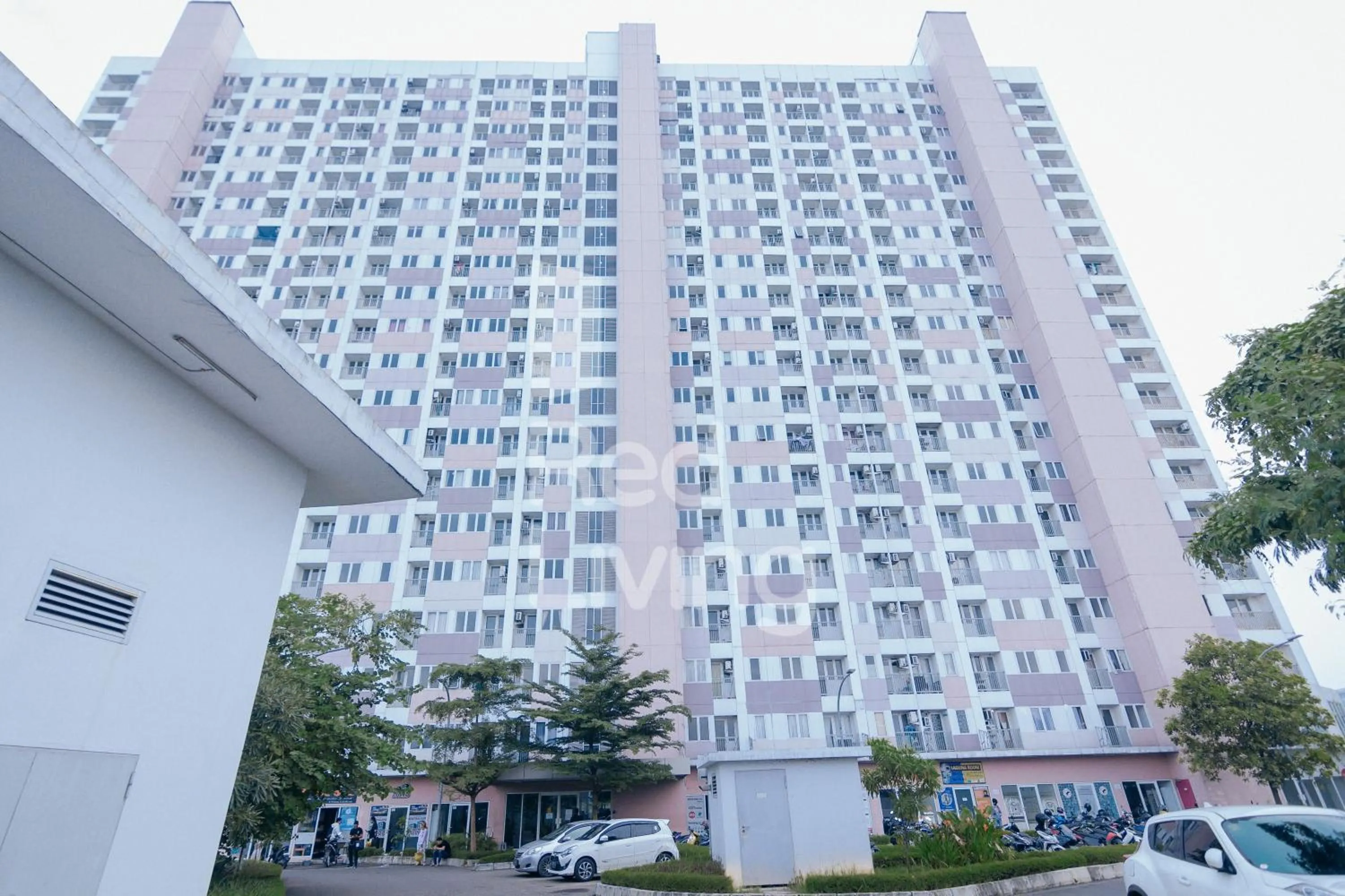 Property building in Redliving Apartemen Grand Sentraland - AT Properti Tower Pink