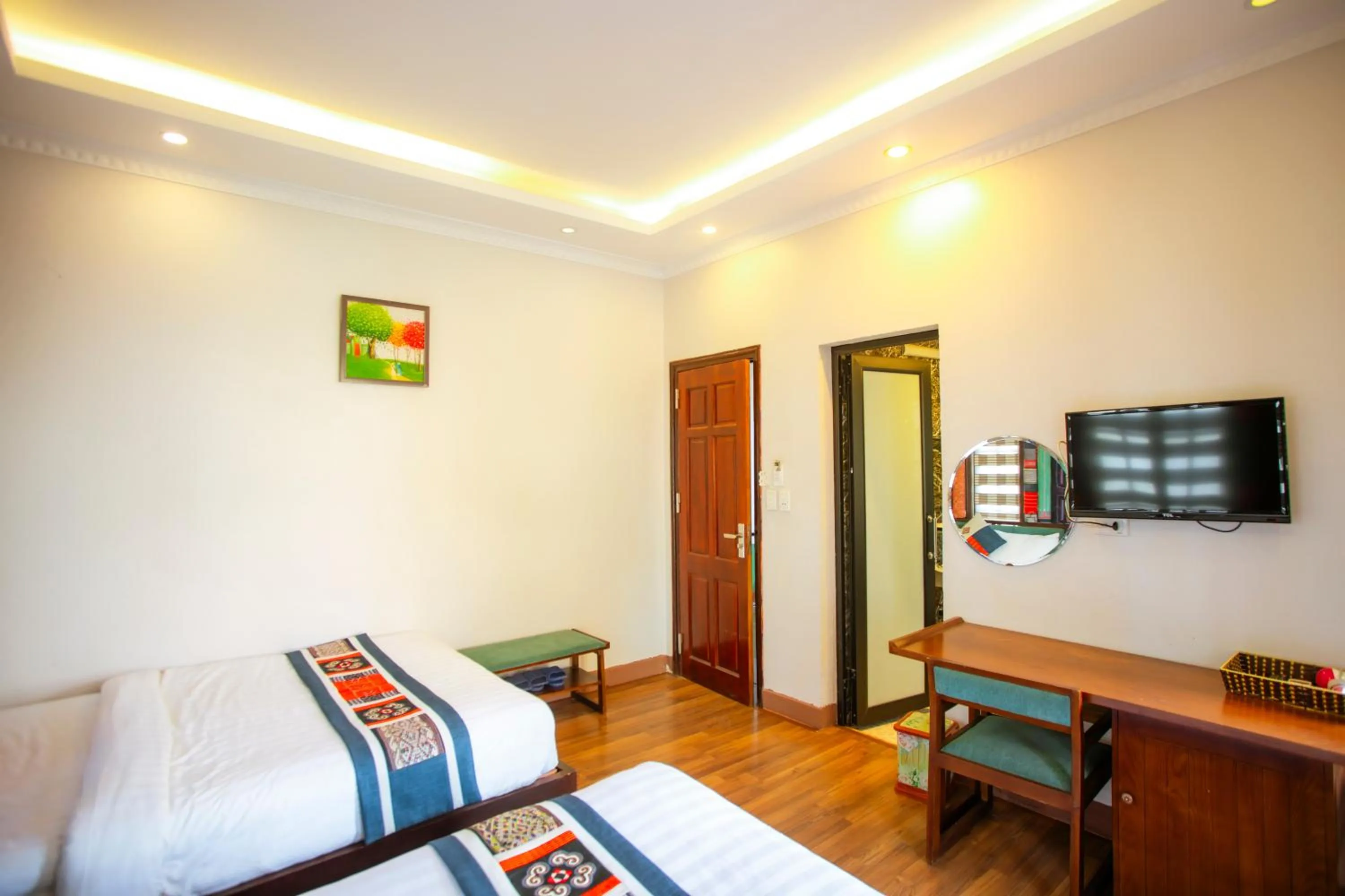 Communal lounge/ TV room, Bed in Le Boutique Sapa Hotel