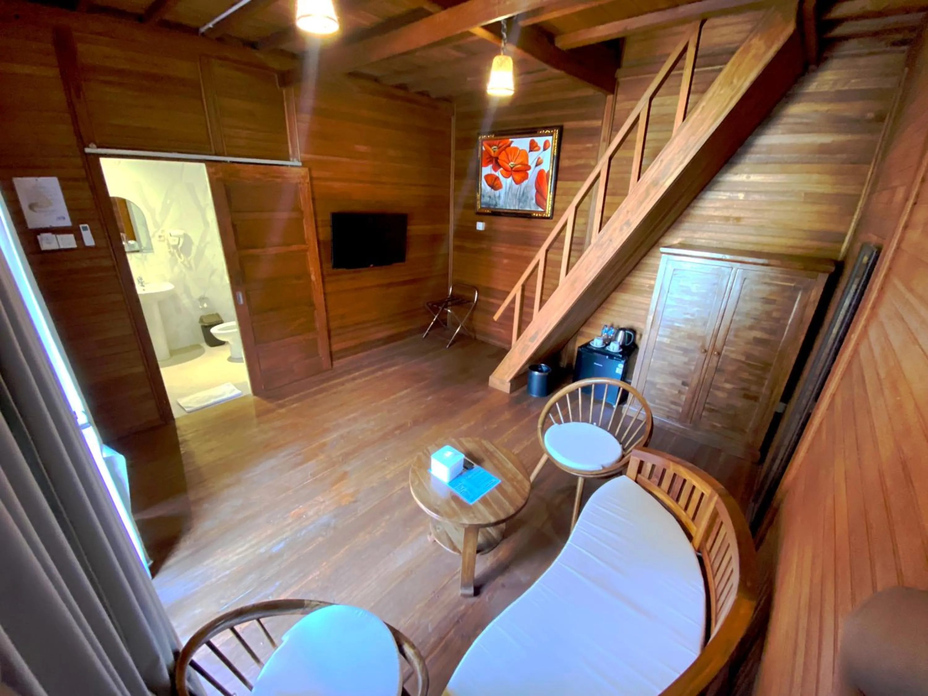 Communal lounge/ TV room in Andi Beach House