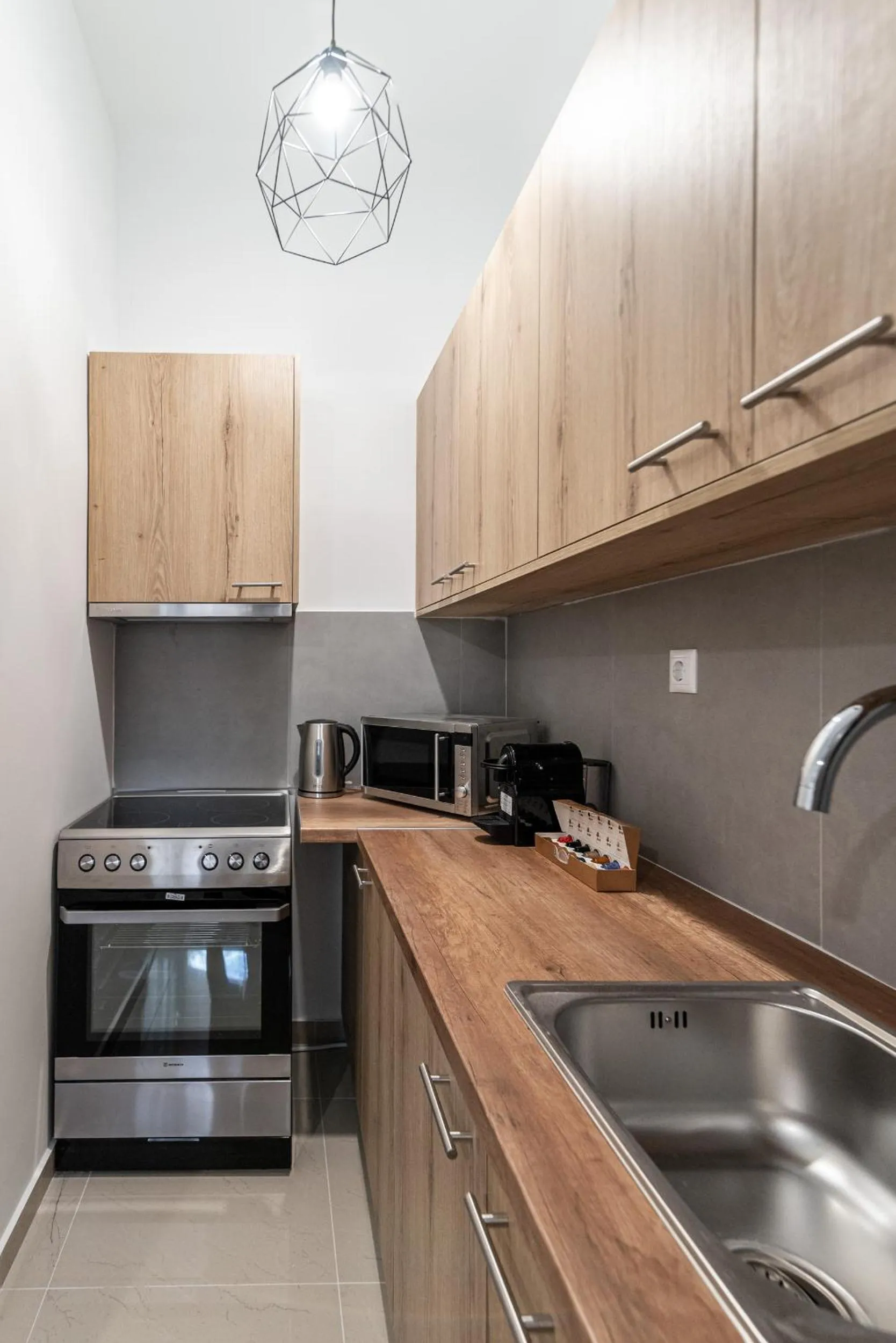 Kitchen or kitchenette in Blue Riviera villas & suites - Alimos 2