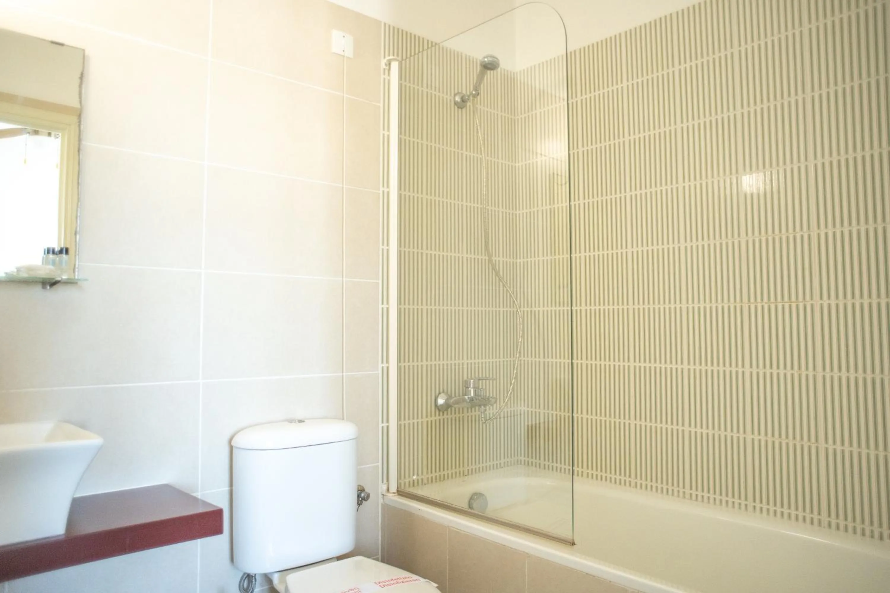 Bathroom in Lagou Raxi Country Hotel