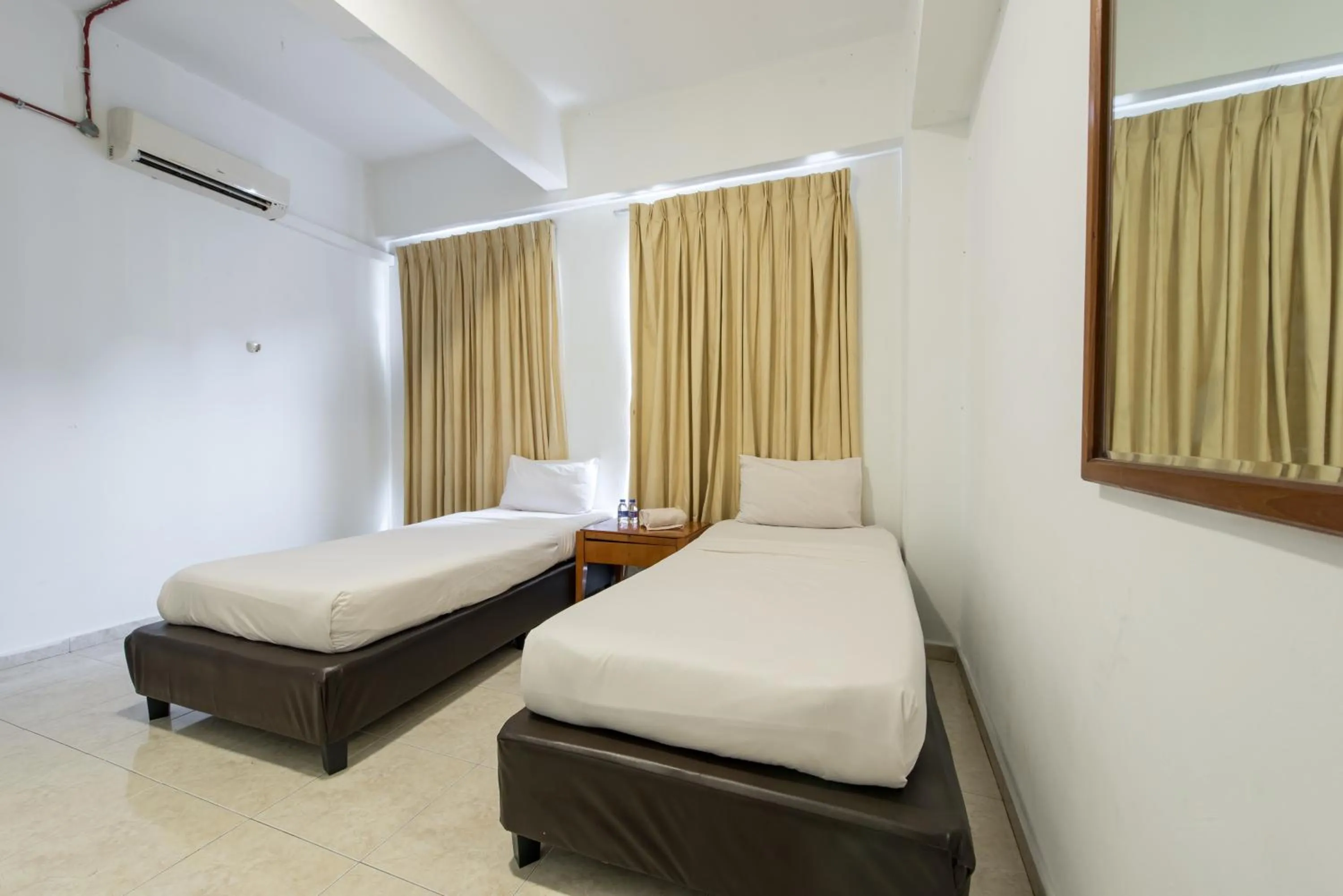 Bed in Hollitel Hotel Melaka