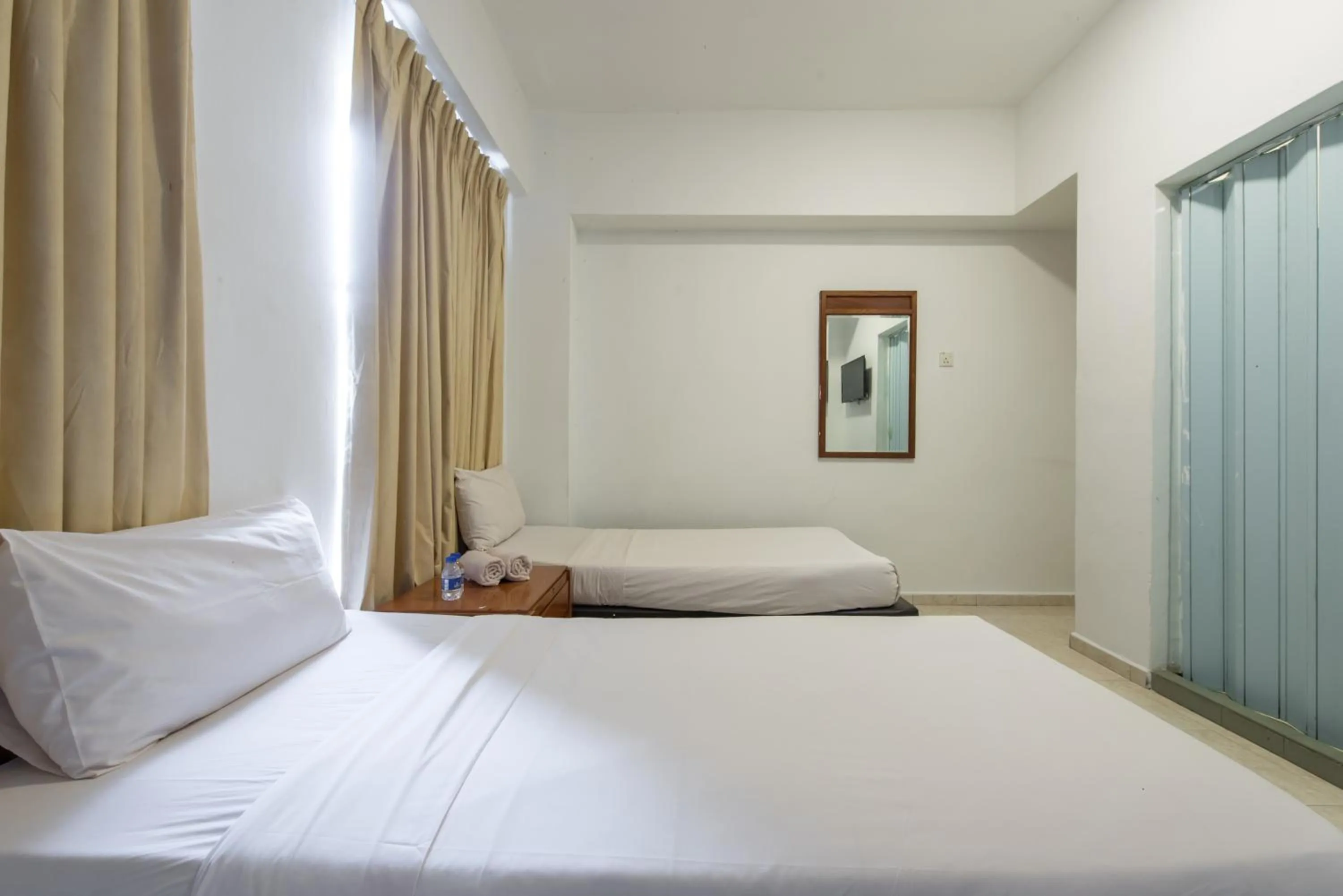 View (from property/room), Bed in Hollitel Hotel Melaka