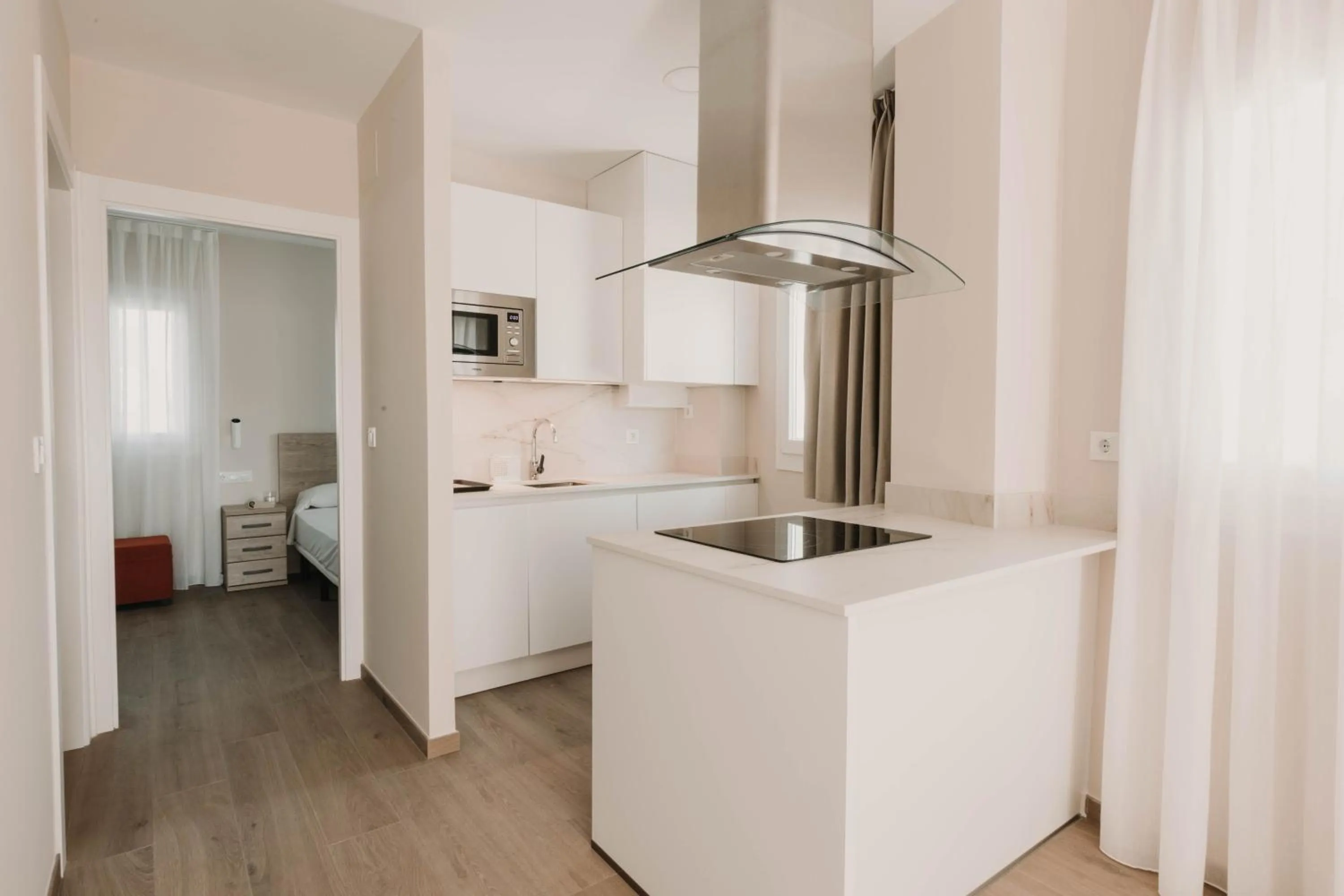 Kitchen or kitchenette, Bed in Apartamentos SubUp