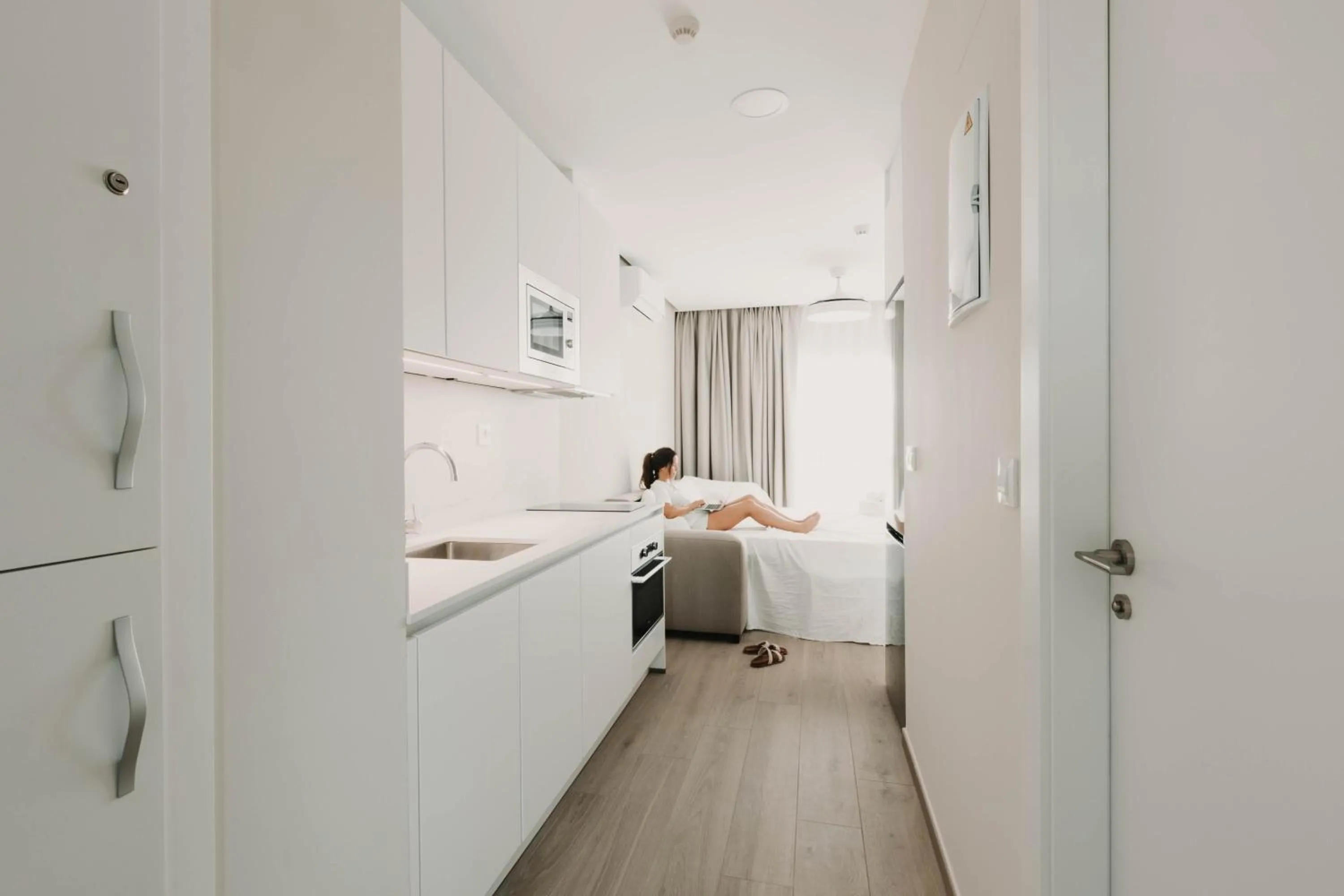 Kitchen or kitchenette, Bed in Apartamentos SubUp