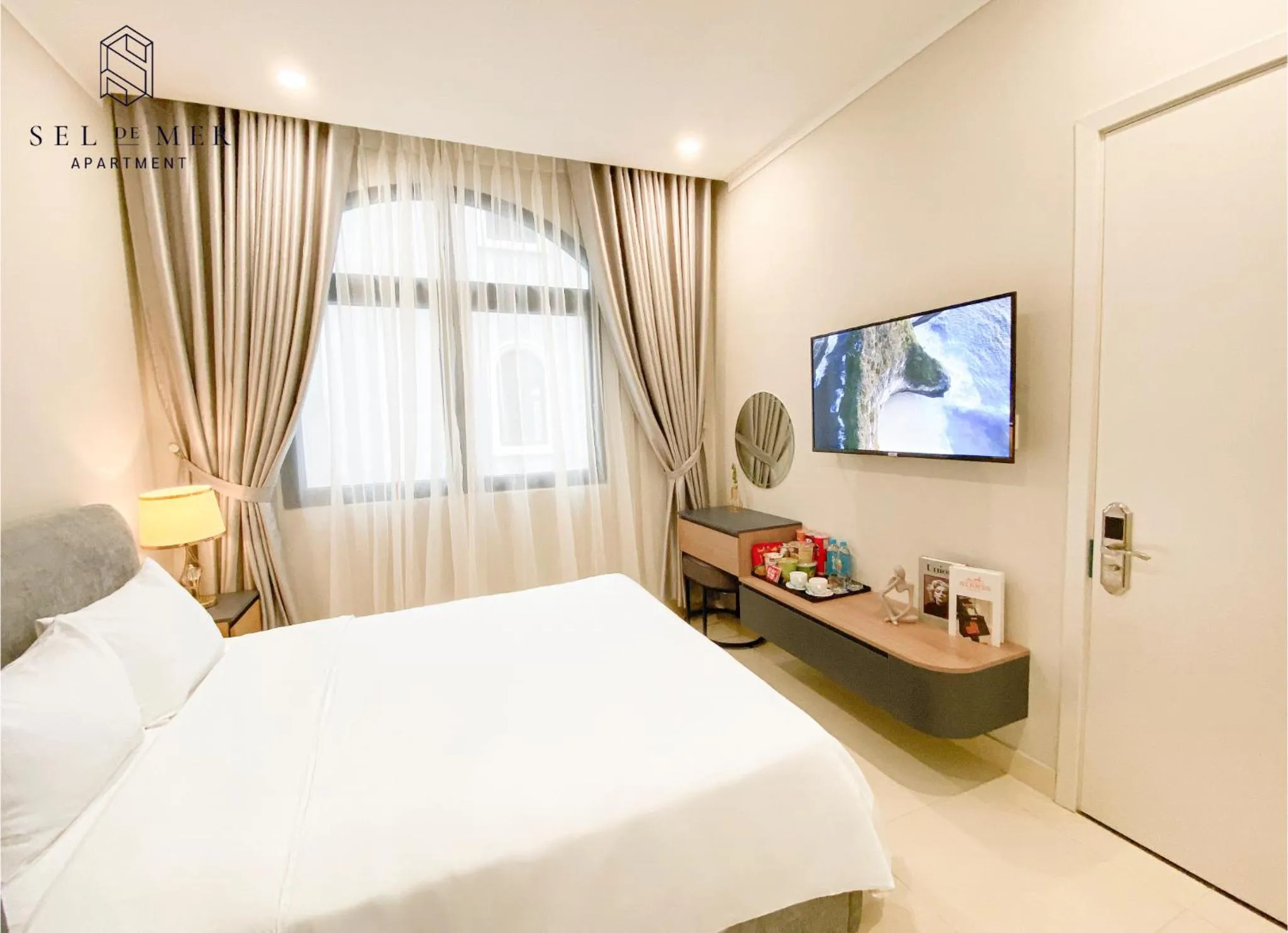 Communal lounge/ TV room, Bed in Sel de Mer Apartment Grand World Phu Quoc