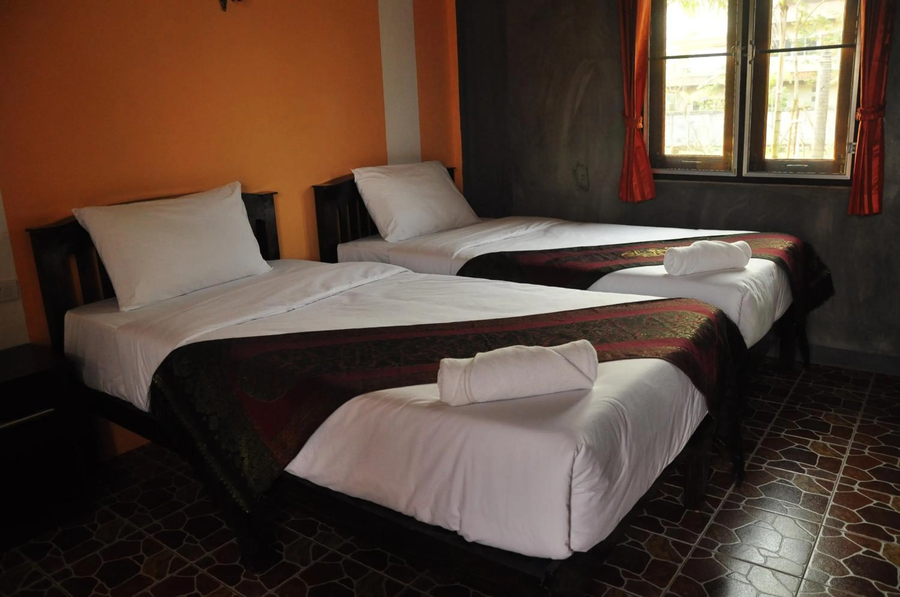 Bed in Chiang Rai Khuakrae Resort