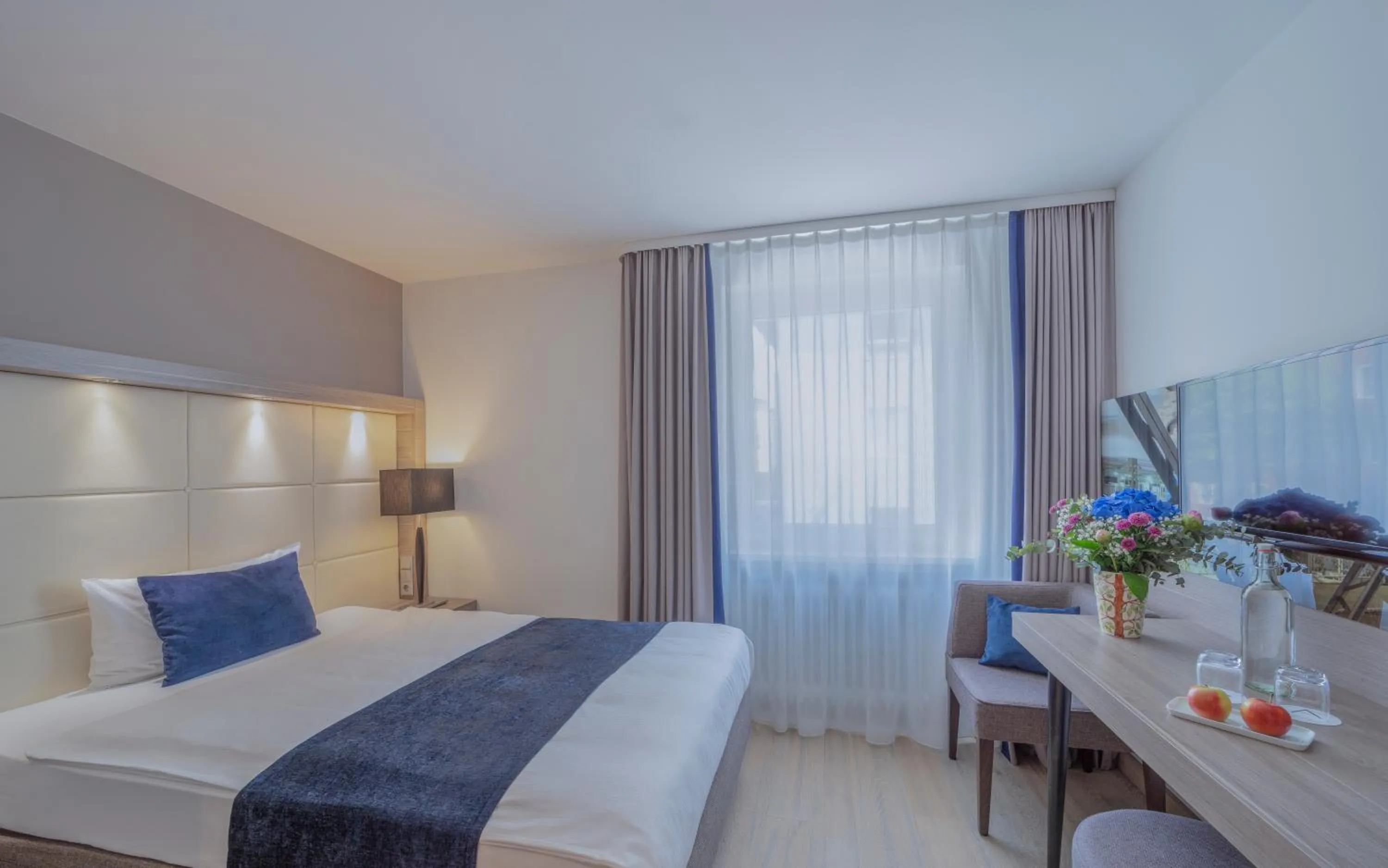 Bed in The Alex Hotel