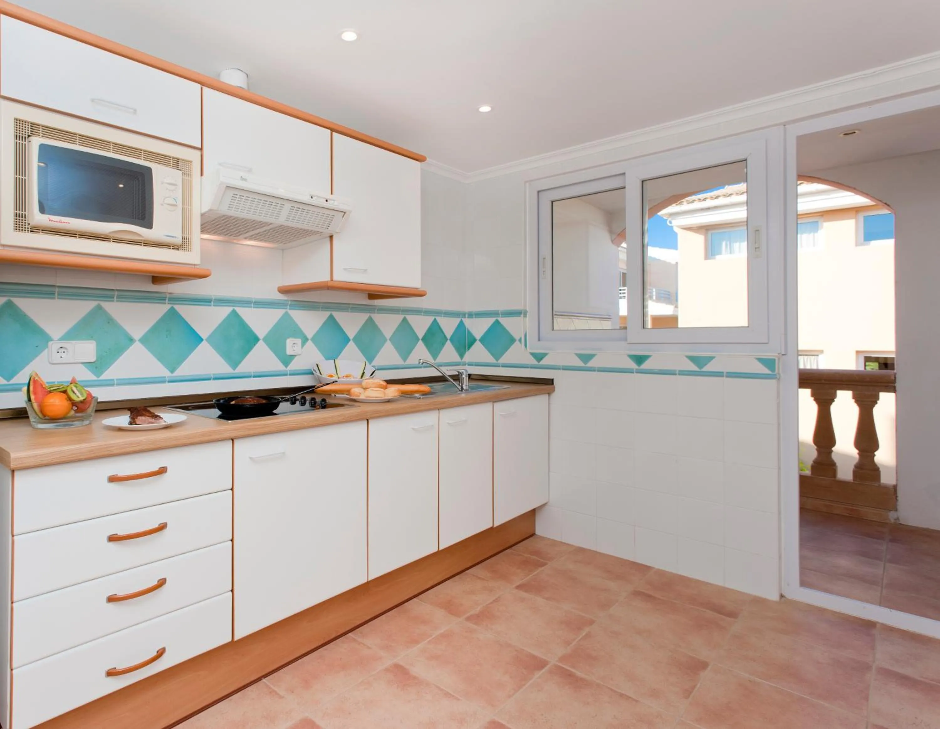 Kitchen or kitchenette in Insotel Cala Mandia Resort