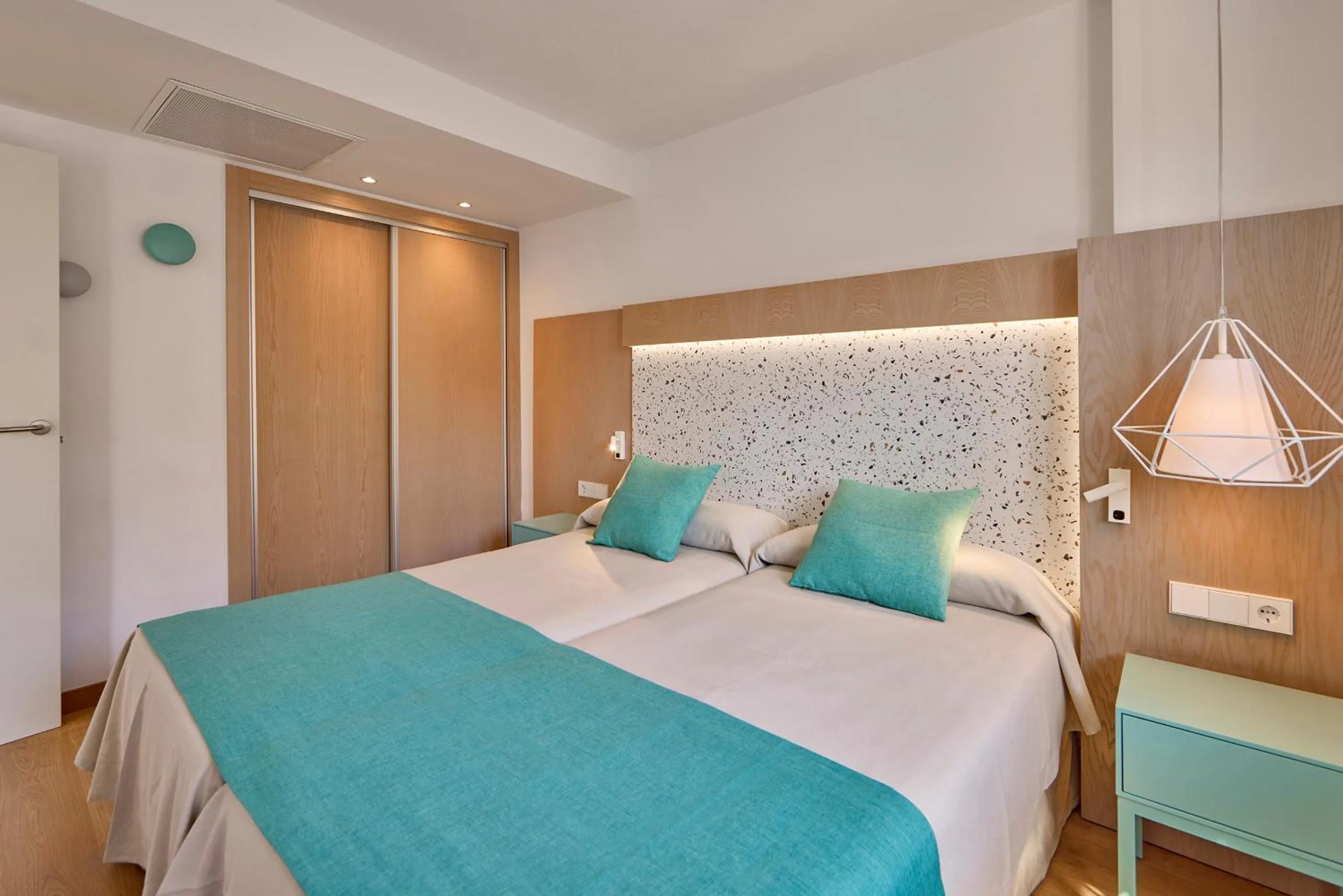 Bed in Universal Aparthotel Elisa